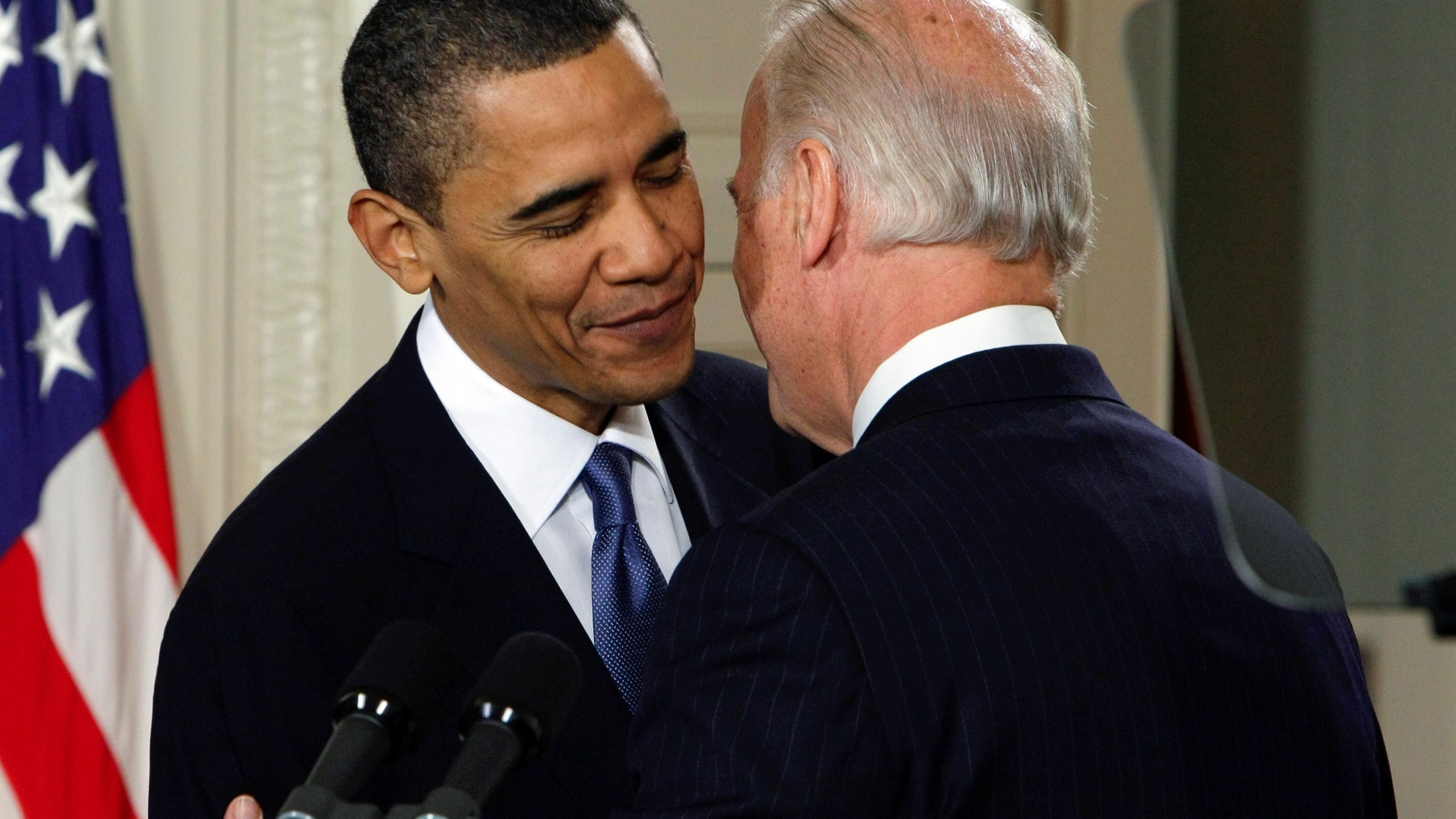 FILE - Vice President Joe Biden whispers "This is a big f------ deal," to President Barack Obama after introducing Obama during the health care bill ceremony in the East Room of the White House in Washington, March 23, 2010. President Joe Biden will share a stage with Barack Obama and Bill Clinton in New York as he raises money for his reelection campaign. Thursday's event is a one-of-a-kind political extravaganza that will showcase decades of Democratic leadership. (AP Photo/J. Scott Applewhite, File)