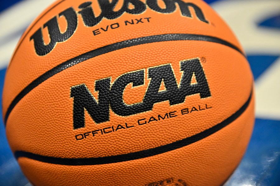 FILE - An official game ball sits on the court during the second half of an NCAA college basketball game between Southern California and UCLA in the semifinals of the Pac-12 tournament Friday, March 8, 2024, in Las Vegas. NCAA President Charlie Baker on Wednesday, March 26, urged lawmakers in states with legal wagering on sporting events to ban betting on individual player performances.(AP Photo/David Becker, File)