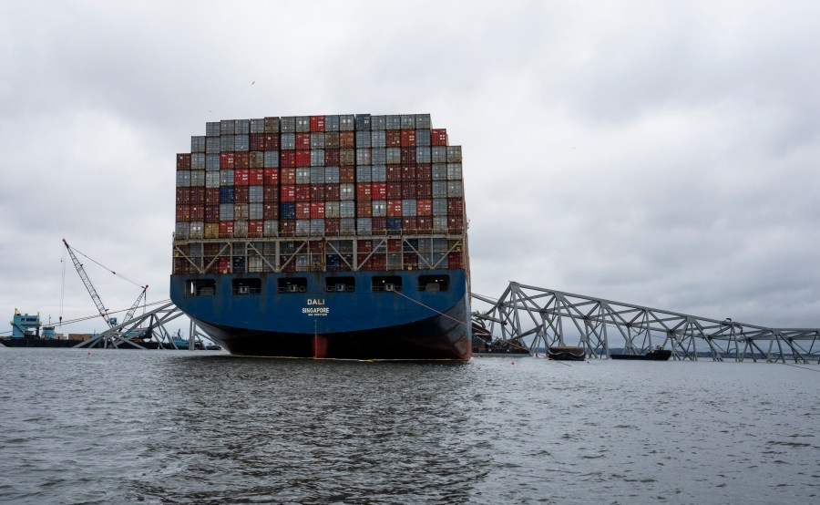 The Dali, a massive container ship from Singapore, still sits amid the wreckage and collapse of the Francis Scott Key Bridge in the Baltimore port, Monday, April 1, 2024. (Kaitlin Newman/The Baltimore Banner via AP)