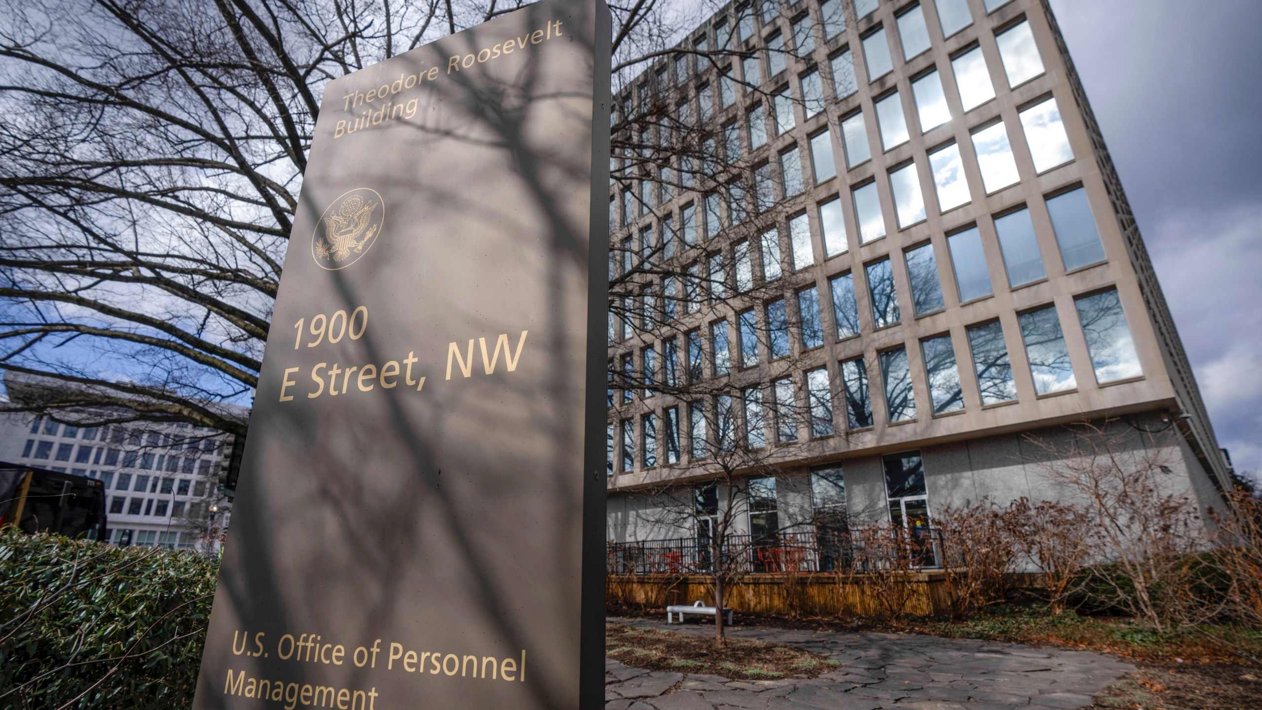 FILE - The Theodore Roosevelt Building, location of the U.S. Office of Personnel Management, on Feb. 13, 2024, in Washington. The government's chief human resources agency has issued a new rule making it harder to fire thousands of federal employees. Advocates hope the rule will head off former President Donald Trump's promises to radically remake the workforce along ideological lines if he wins back the White House in November. (AP Photo/Mark Schiefelbein, File)