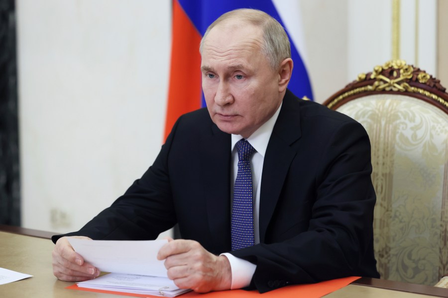 Russian President Vladimir Putin chairs a Security Council meeting via videoconference at the Kremlin in Moscow, Russia, Friday, April 5, 2024. (Mikhail Metzel, Sputnik, Kremlin Pool Photo via AP)