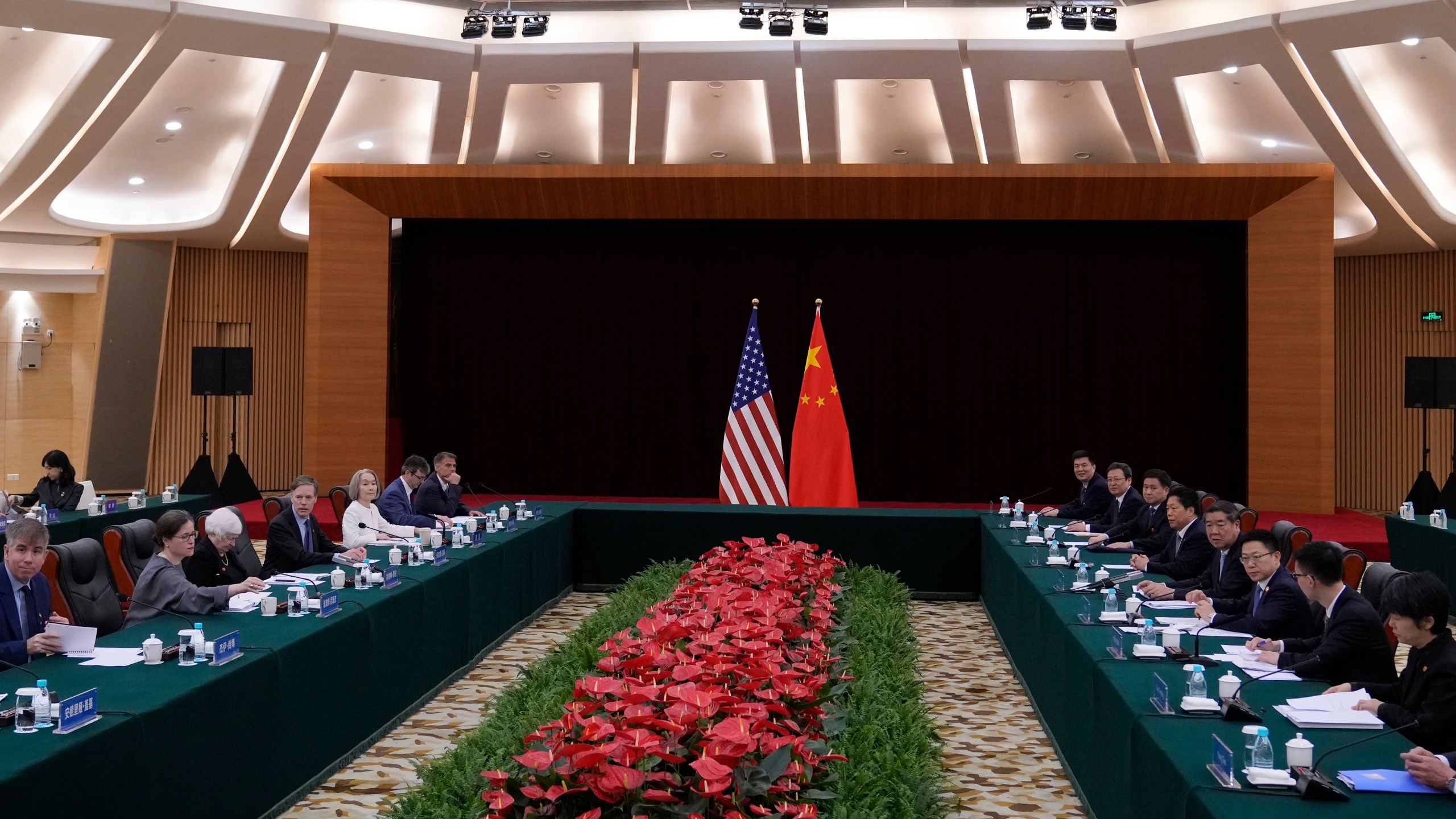 U.S. Treasury Secretary Janet Yellen, third from left, and Chinese Vice Premier He Lifeng, fourth from right, sit for a bilateral meeting at the Guangdong Zhudao Guest House in southern China's Guangdong province, Saturday, April 6, 2024. (AP Photo/Andy Wong, Pool)