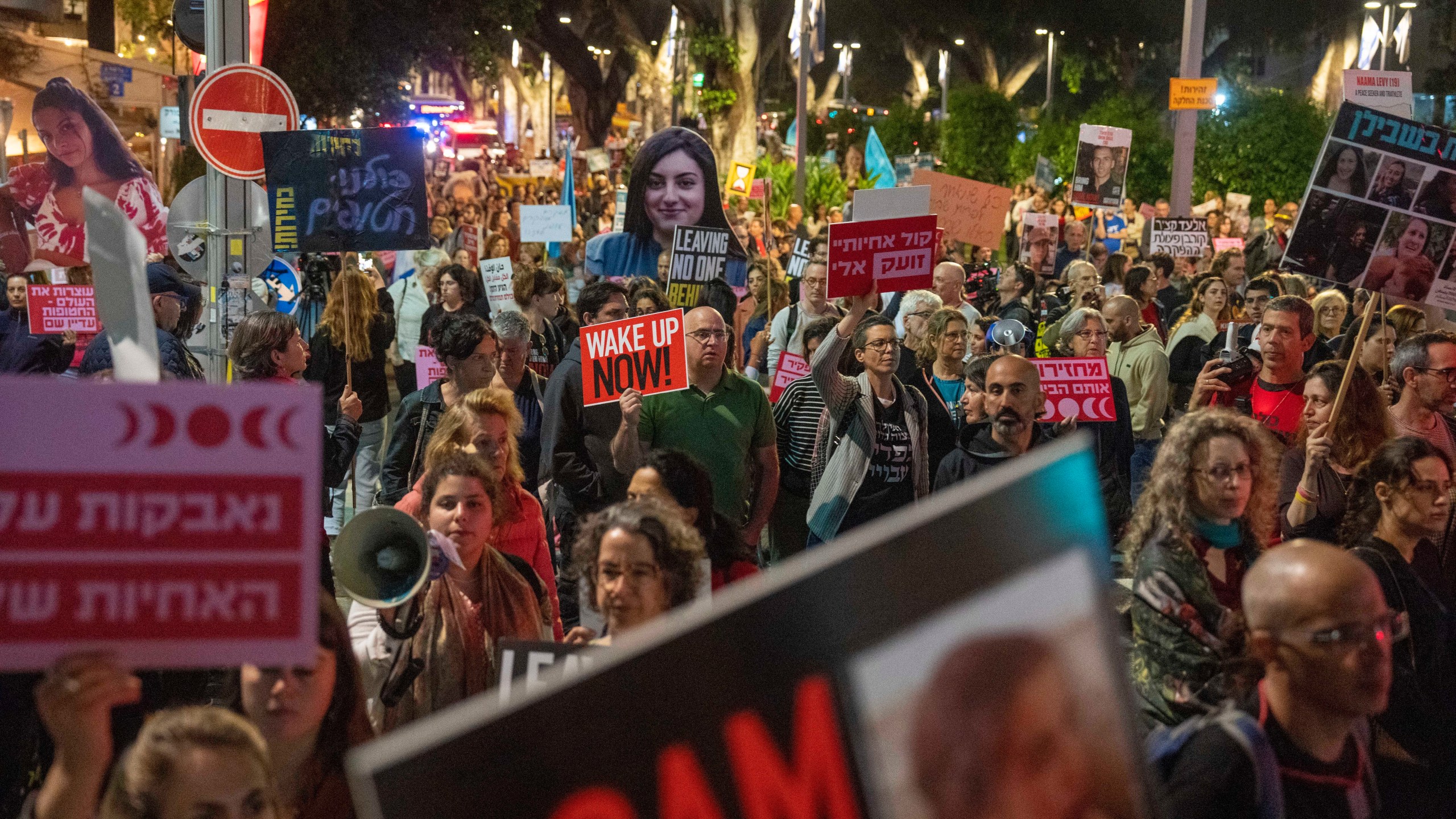 People protest against Israeli Prime Minister Benjamin Netanyahu's government and call for the release of hostages held in the Gaza Strip by the Hamas militant group in Tel Aviv, Israel, Thursday, April 11, 2024. (AP Photo/Ariel Schalit)