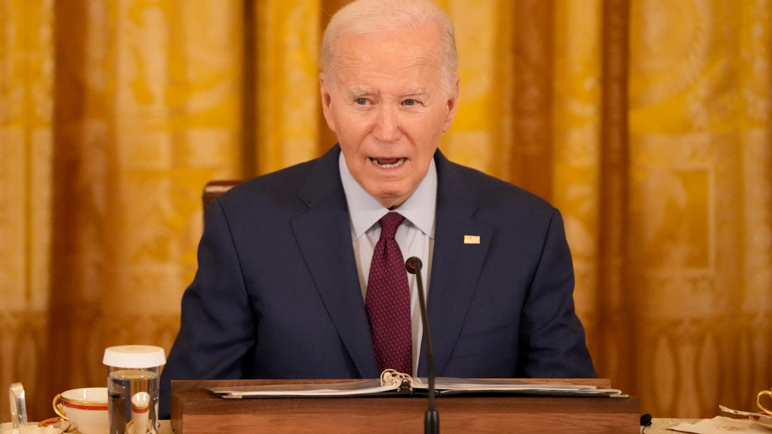 President Joe Biden speaks during a trilateral meeting with Philippine President Ferdinand Marcos Jr. and Japanese Prime Minister Fumio Kishida in the East Room of the White House in Washington, Thursday, April 11, 2024. (AP Photo/Mark Schiefelbein)