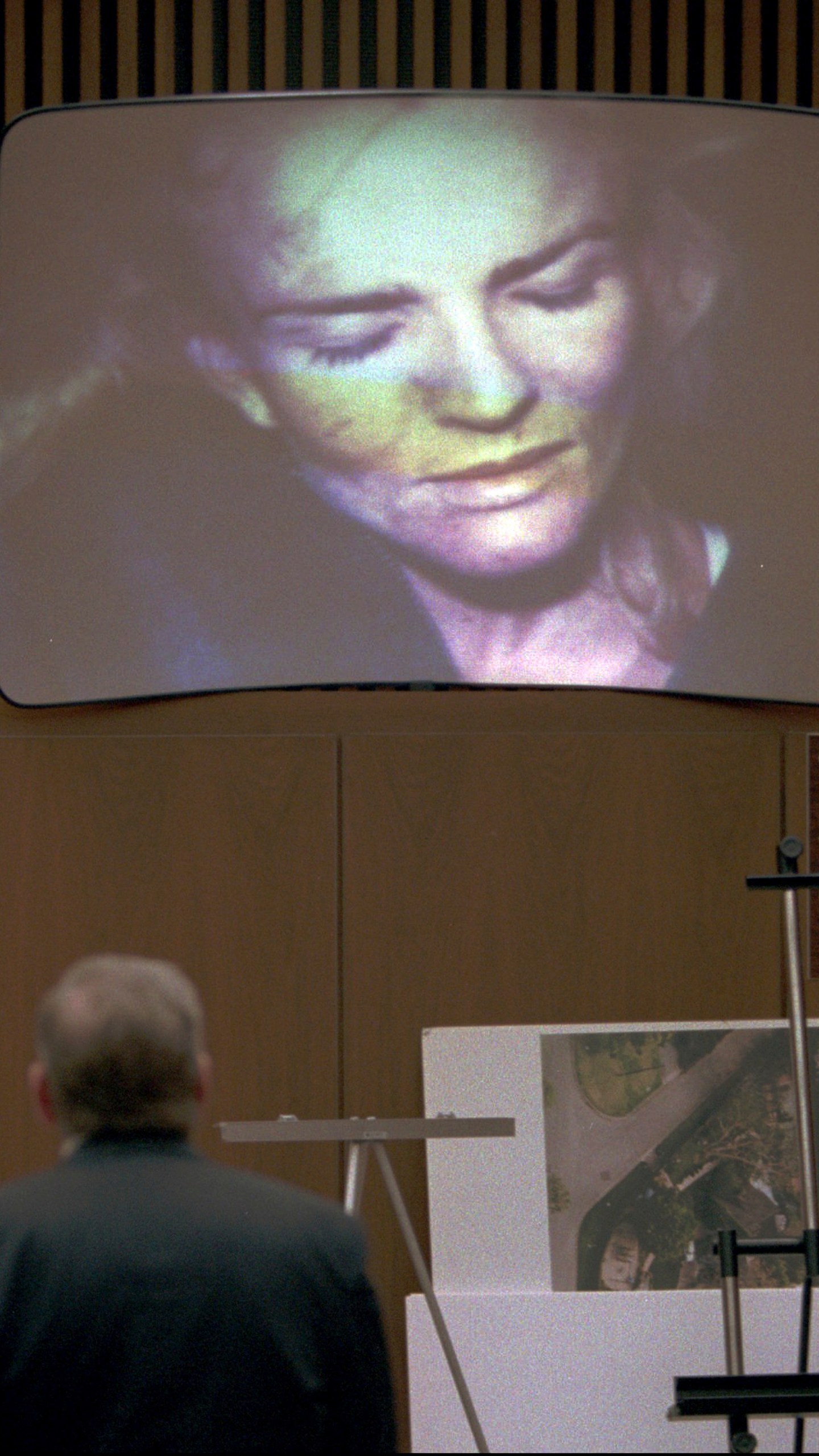 FILE - This Jan. 31, 1995, file photo shows the projected image of a Jan. 1, 1989 Los Angeles Police Department photo, introduced as evidence in the O.J. Simpson double-murder trial in Los Angeles. Thirty years ago, as women’s rights advocates worked to pass the 1994 Violence Against Women Act, domestic violence was still something of a hushed topic. Then Nicole Brown Simpson’s death forced it into the spotlight. Americans riveted by the murder investigation of superstar ex-husband O.J. Simpson, who died Wednesday, April 11, 2024 at 76, heard startling and painful details of the abuse she said she suffered at his hands. (AP Photo/David Sprague, Pool, File)