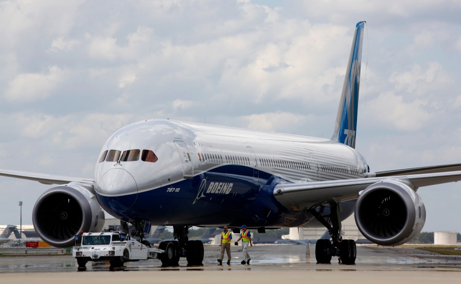 FILE - Boeing employees walk the new Boeing 787-10 Dreamliner down towards the delivery ramp area at the company's facility after conducting its first test flight at Charleston International Airport, Friday, March 31, 2017, in North Charleston, S.C. A Senate subcommittee has opened an investigation into the safety of Boeing jetliners, intensifying safety concerns about the company’s aircraft. The panel has summoned Boeing's CEO, Dave Calhoun, to a hearing next week where a company engineer, Sam Salehpour, is expected to detail safety concerns about the manufacture and assembly of Boeing’s 787 Dreamliner. (AP Photo/Mic Smith, File)