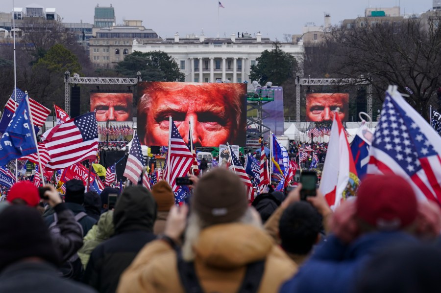 FILE - Supporters of Donald Trump participate in a rally in Washington, Jan. 6, 2021. The Supreme Court is hearing arguments Tuesday, April 16, 2024, over the charge of obstruction of an official proceeding that has been brought against 330 people, according to the Justice Department. The charge refers to the disruption of Congress' certification of Joe Biden's 2020 presidential election victory over former President Trump. Trump faces two obstruction charges. Next week, the justices will weigh whether Trump can be prosecuted at all for his efforts to overturn the 2020 election results. (AP Photo/John Minchillo, File)