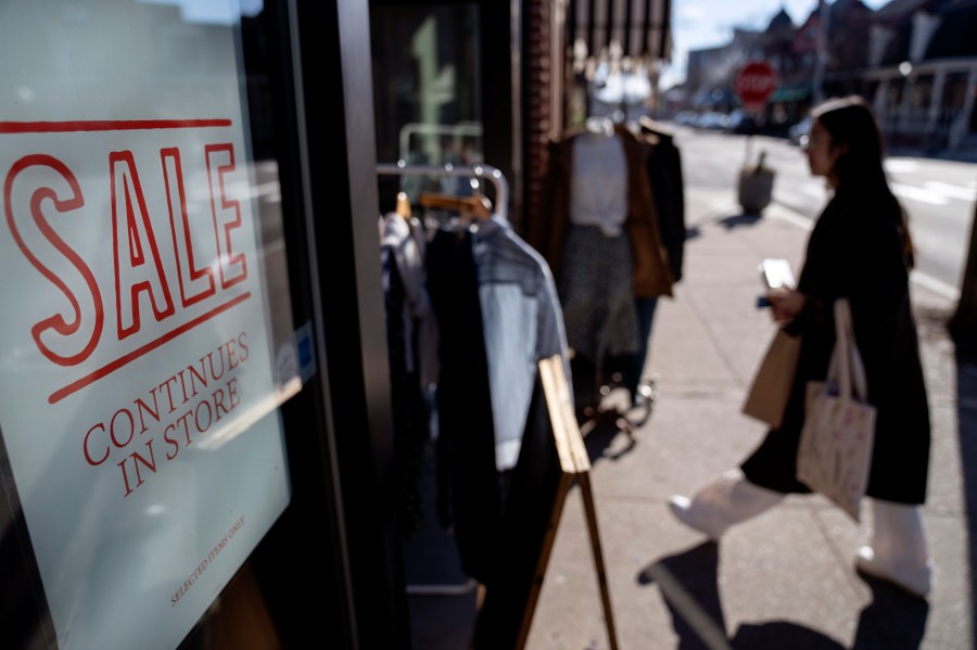 FILE - A shop holds a sidewalk sale on Feb. 10, 2023, in Providence, R.I. Record numbers of people are starting new businesses, and more and more of them are women and minorities, according to a new study.(AP Photo/David Goldman, File)