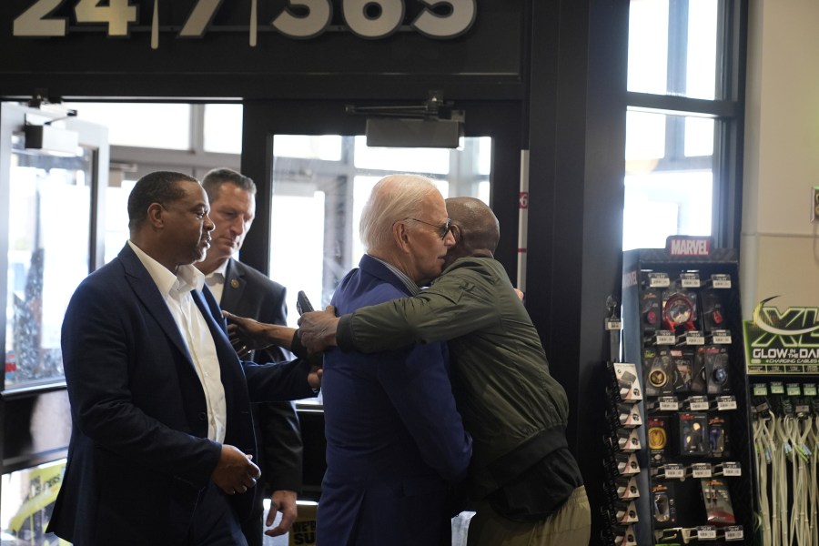 President Joe Biden is greeted after walking into a Sheetz after stopping enroute to Pittsburgh International Airport, Wednesday, April 17, 2024, in Pittsburgh, Pa. (AP Photo/Alex Brandon))