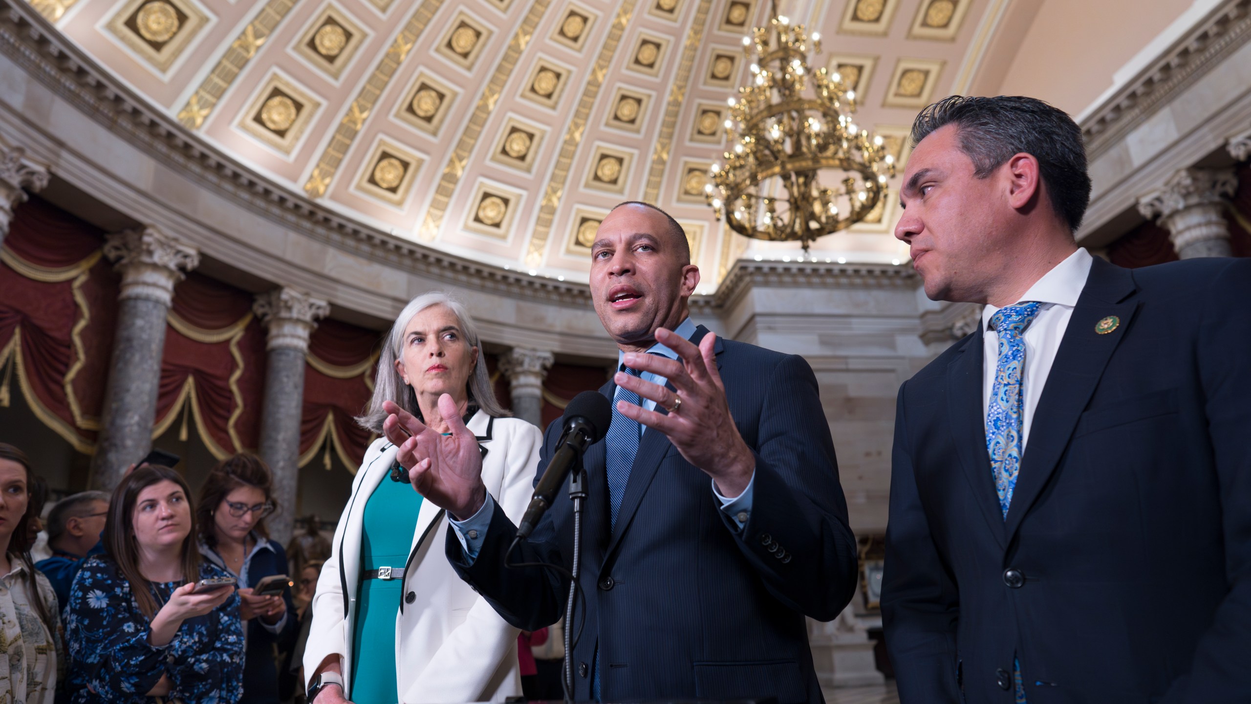 House Minority Leader Hakeem Jeffries, D-N.Y., center, flanked by Rep. Katherine Clark, D-Mass., the Democratic whip, left, and Rep. Pete Aguilar, D-Calif., the Democratic Caucus chair, speaks to reporters about the need for aid to allies Ukraine, Israel and Taiwan following weeks of inaction, at the Capitol in Washington, Wednesday, April 17, 2024. (AP Photo/J. Scott Applewhite)