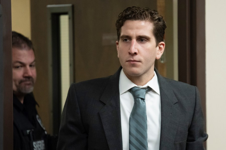 FILE - Bryan Kohberger, right, is escorted into a courtroom for a hearing in Latah County District Court, Sept. 13, 2023, in Moscow, Idaho. Kohberger, the man charged in the deaths of four University of Idaho students in late 2022, was out for a drive the night they were killed, his attorneys said in a new court filing Wednesday, April 17, 2024, that lays out more details of the alibi defense he intends to use at his trial. (AP Photo/Ted S. Warren, Pool, File)