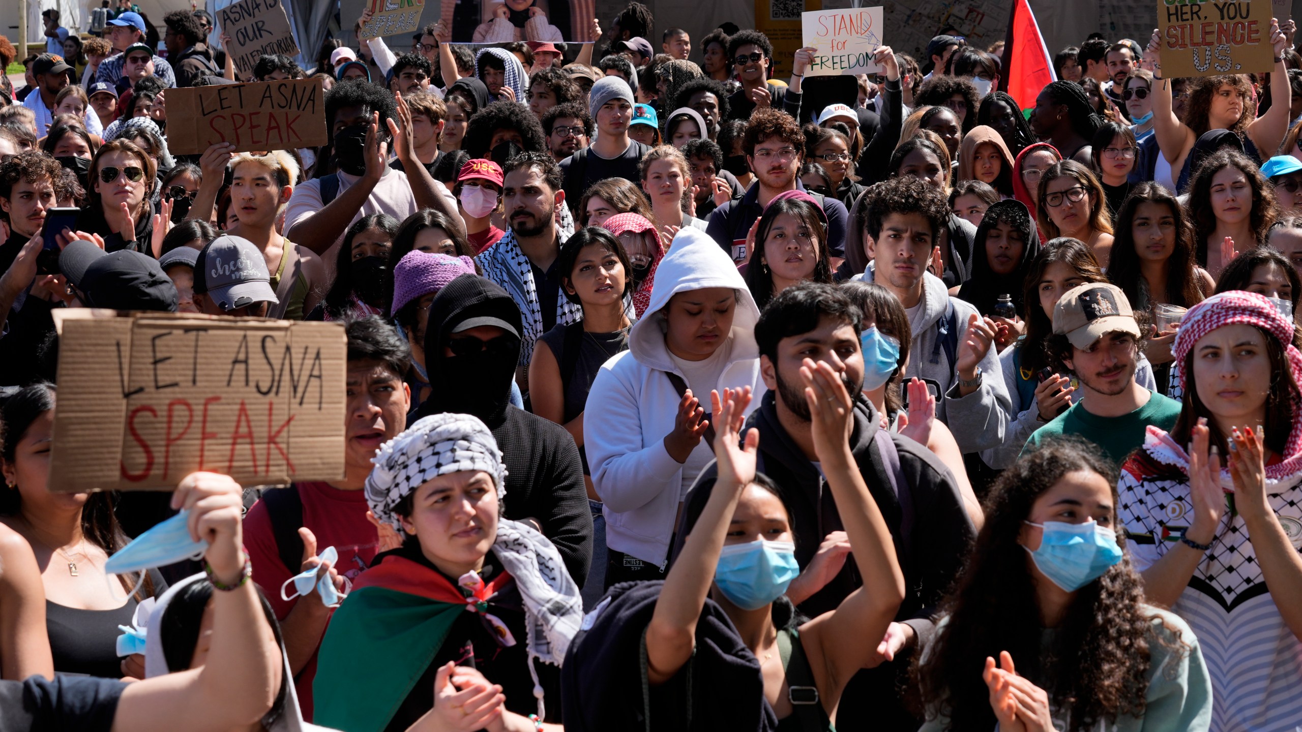 Students protest a canceled commencement speech by its 2024 valedictorian who has publicly supported Palestinians on the campus of University of Southern California on Thursday, April 18, 2024. The University of Southern California was citing security concerns, in a rare decision that was praised by several pro-Israel groups and lambasted by free speech advocates and the country's largest Muslim civil rights organization. (AP Photo/Damian Dovarganes)