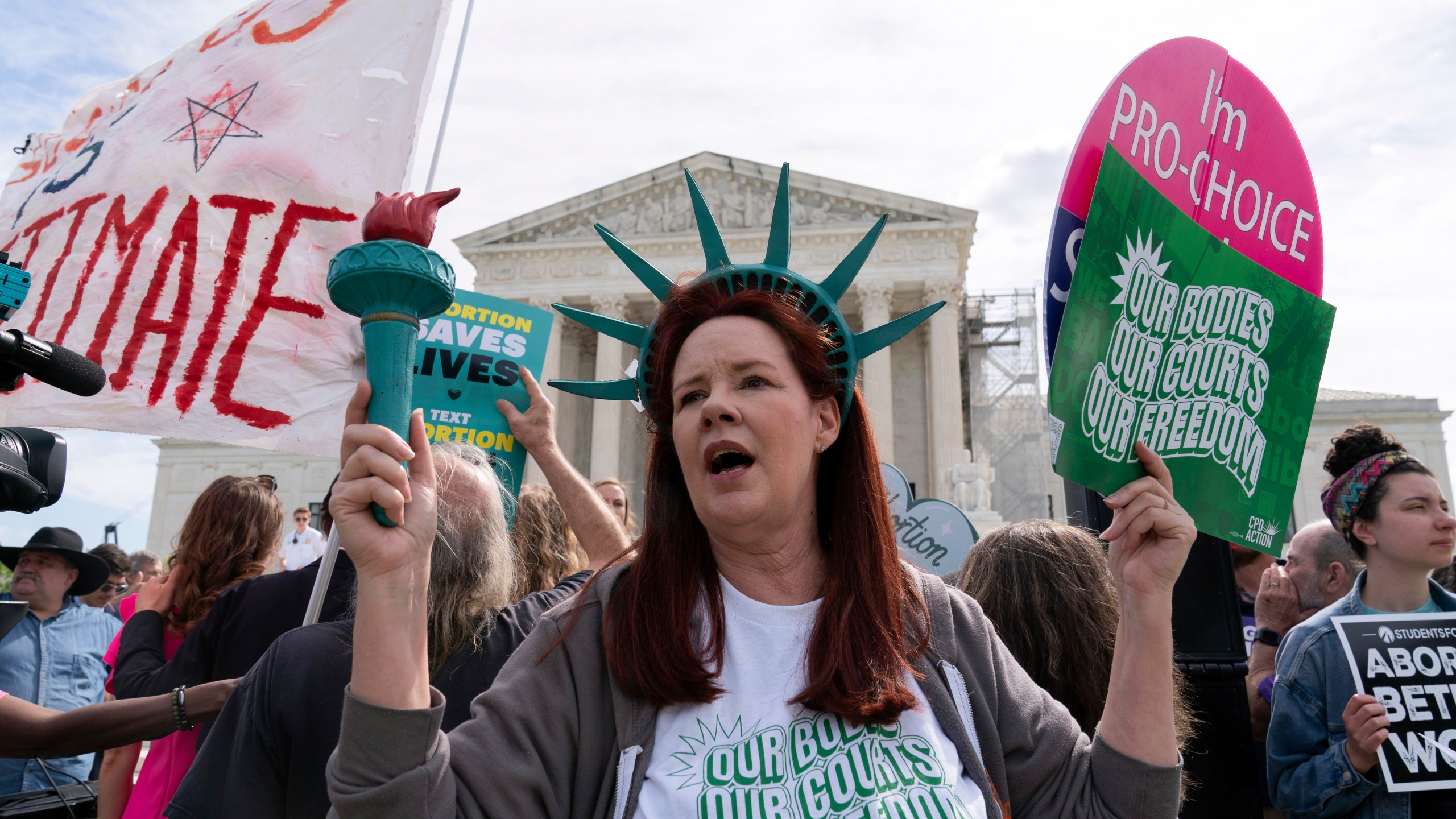 Abortion-rights activists rally outside the Supreme Court, Wednesday, April 24, 2024, in Washington. (AP Photo/Jose Luis Magana)