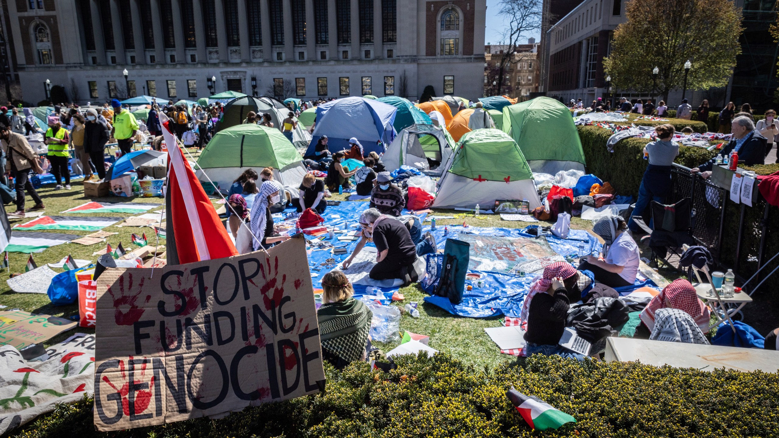 A sign sits erected at the pro-Palestinian demonstration encampment at Columbia University in New York, Monday, April 22, 2024. (AP Photo/Stefan Jeremiah)