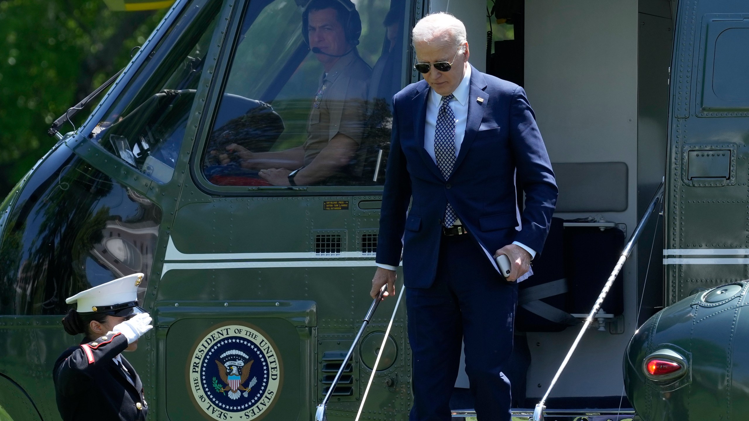 President Joe Biden steps off of Marine One on the South Lawn of the White House in Washington, Friday, April 26, 2024, as he returns from a trip to New York. (AP Photo/Susan Walsh)