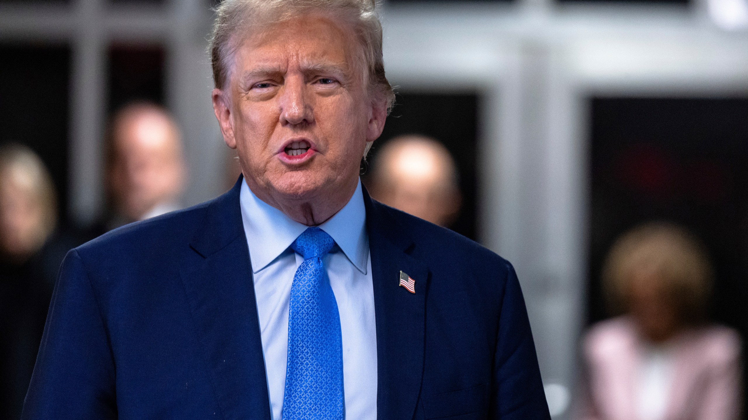 Former President Donald Trump speaks to members of the media as he arrives at Manhattan criminal court in New York, Friday, April 26, 2024. (Michael M. Santiago/Getty Images)