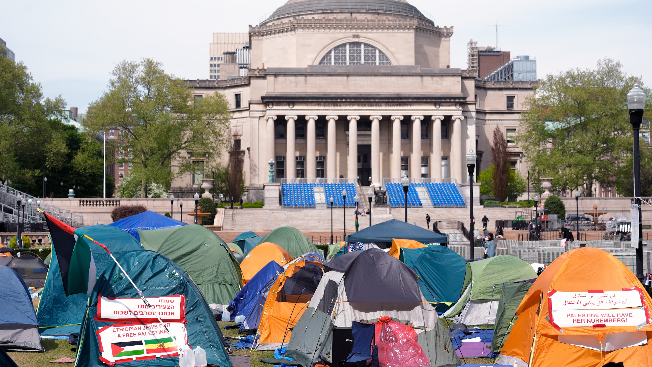 Student protesters camp on the campus of Columbia University, Tuesday, April 30, 2024, in New York. Early Tuesday, dozens of protesters took over Hamilton Hall, locking arms and carrying furniture and metal barricades to the building. Columbia responded by restricting access to campus. (Pool Photo/Mary Altaffer)