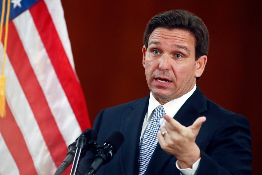 FILE - Florida Gov. Ron DeSantis answers questions from the media, March 7, 2023, at the state Capitol in Tallahassee, Fla. Florida's ban on abortions after six weeks of pregnancy, before many women even know they are pregnant, went into effect Wednesday, May 1, 2024. The Florida Supreme Court, with five of its seven members appointed by DeSantis, ruled 6-1 last month to uphold the state's ban on most abortions after 15 weeks of pregnancy, which cleared the way for the six-week ban. (AP Photo/Phil Sears, File)