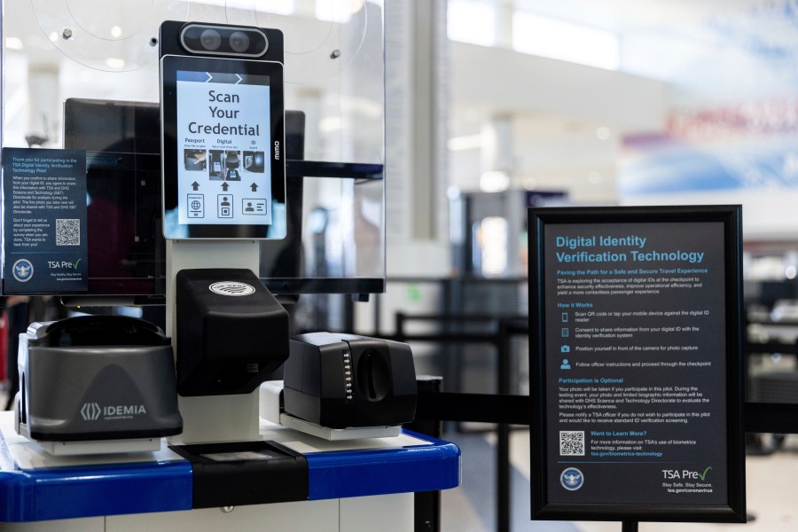 FILE - The Transportation Security Administration's new facial recognition technology is seen at a Baltimore-Washington International Thurgood Marshall Airport security checkpoint, April 26, 2023, in Glen Burnie, Md. A bipartisan group of senators wants restrictions on the use of facial recognition technology by the TSA, saying they're concerned about travelers' privacy and civil liberties.(AP Photo/Julia Nikhinson, File)