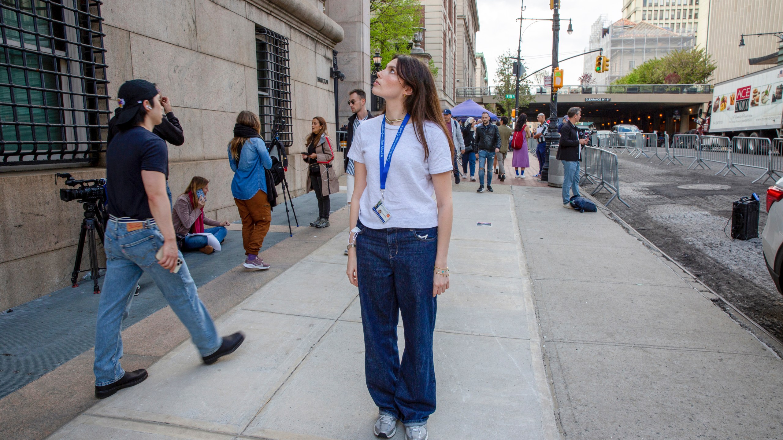 Columbia Journalism School student Cecilia Blotto stands in front of Hamilton Hall on Wednesday, May 1, 2024, in New York, where, hours earlier, New York police burst in to break up a demonstration by protesters who had occupied the building. (AP Photo/Ted Shaffrey)