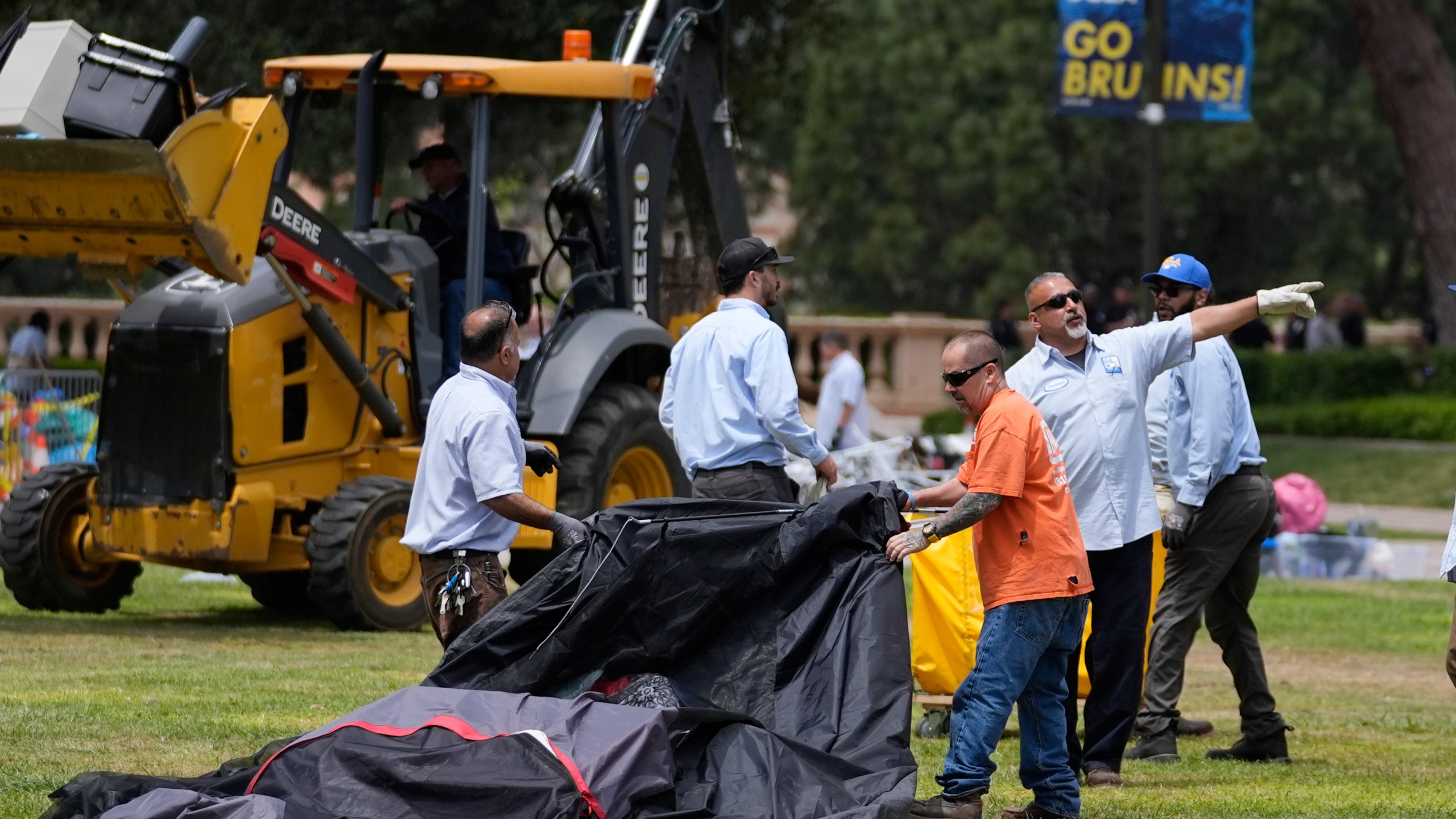 A tent is removed at the site of a pro-Palestinian encampment which was cleared by police overnight on the UCLA campus Thursday, May 2, 2024, in Los Angeles. (AP Photo/Ashley Landis)