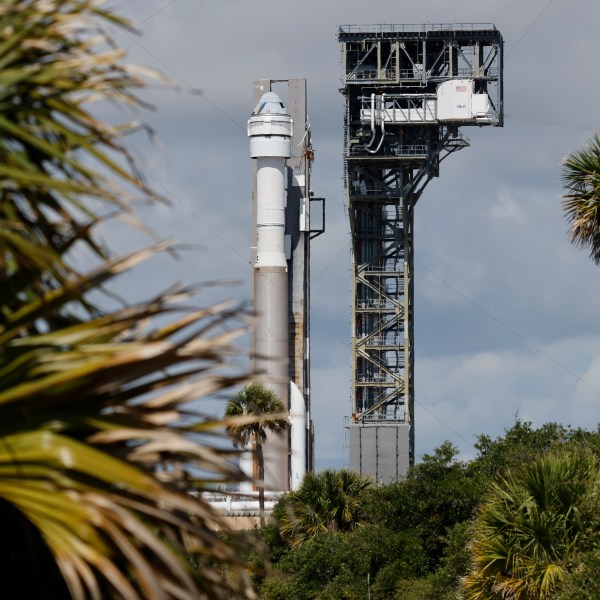 Boeing's Starliner capsule atop an Atlas V rocket is rolled out to the launch pad at Space Launch Complex 41, Saturday, May 4, 2024, in Cape Canaveral, Fla. NASA astronauts Butch Wilmore and Suni Williams will launch aboard to the International Space Station, scheduled for liftoff on May 6, 2024. (AP Photo/Terry Renna)