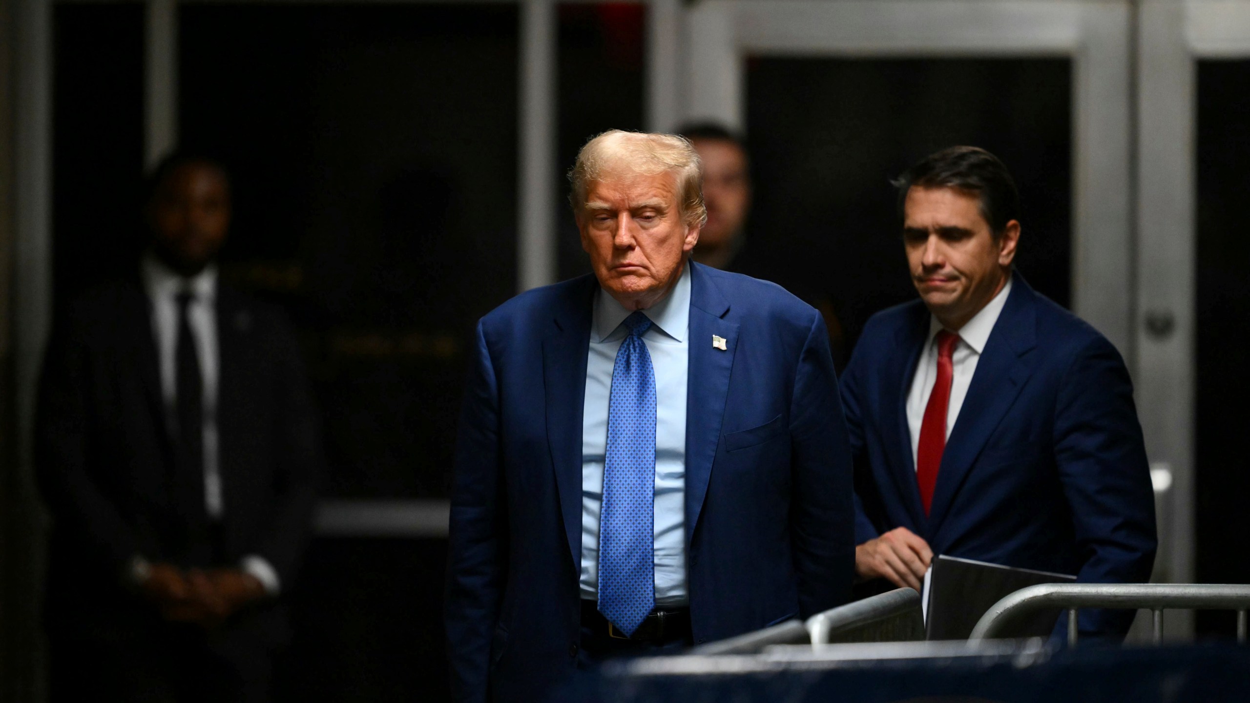 Former President Donald Trump walks to speak to the media at the end of the day of his hush money trial, in New York, Thursday, May 9, 2024. (Angela Weiss/Pool Photo via AP)