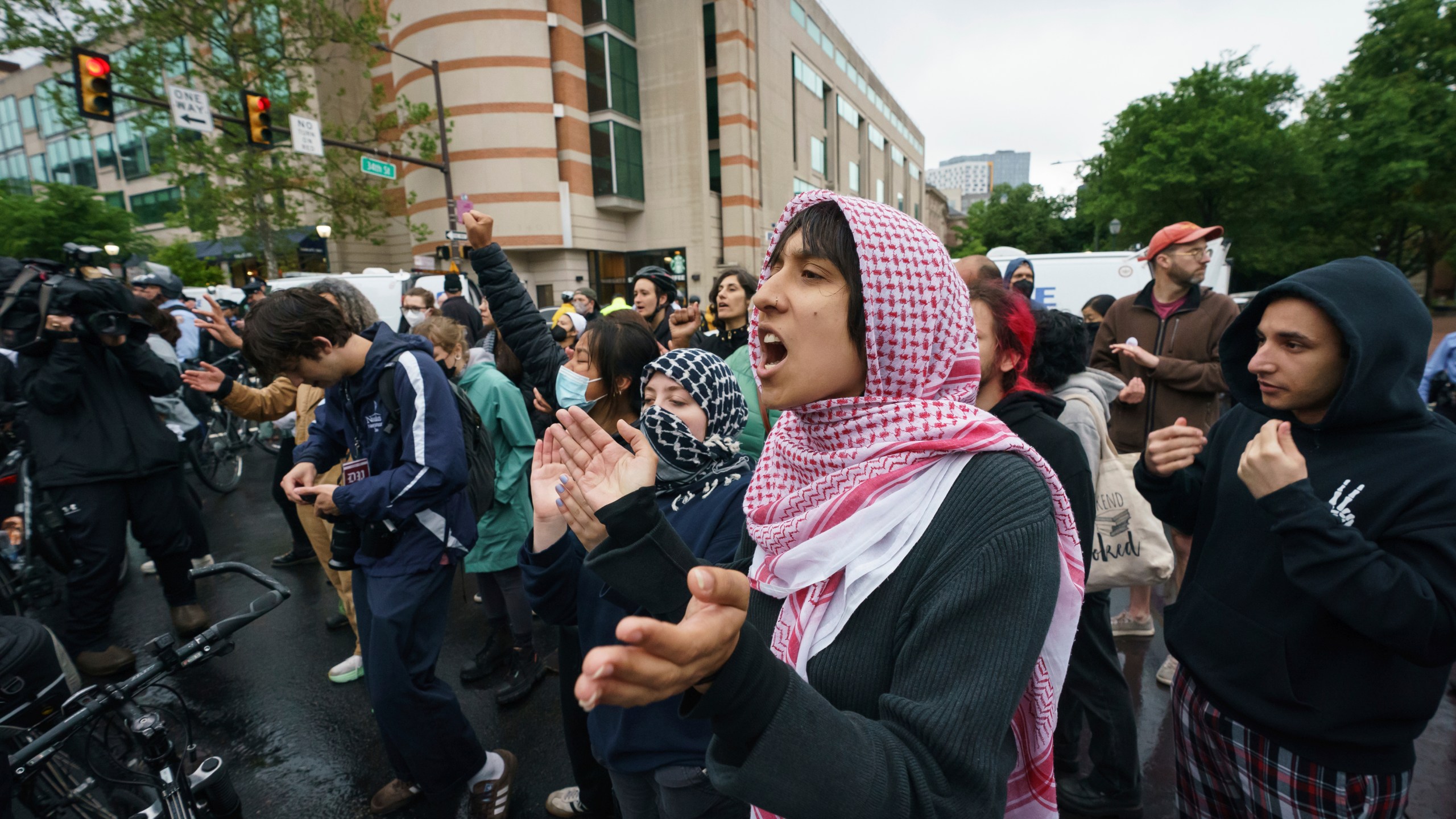 Protesters stand on the University of Pennsylvania campus, in Philadelphia, on Friday, May 10, 2024. (Jessica Griffin/The Philadelphia Inquirer via AP)