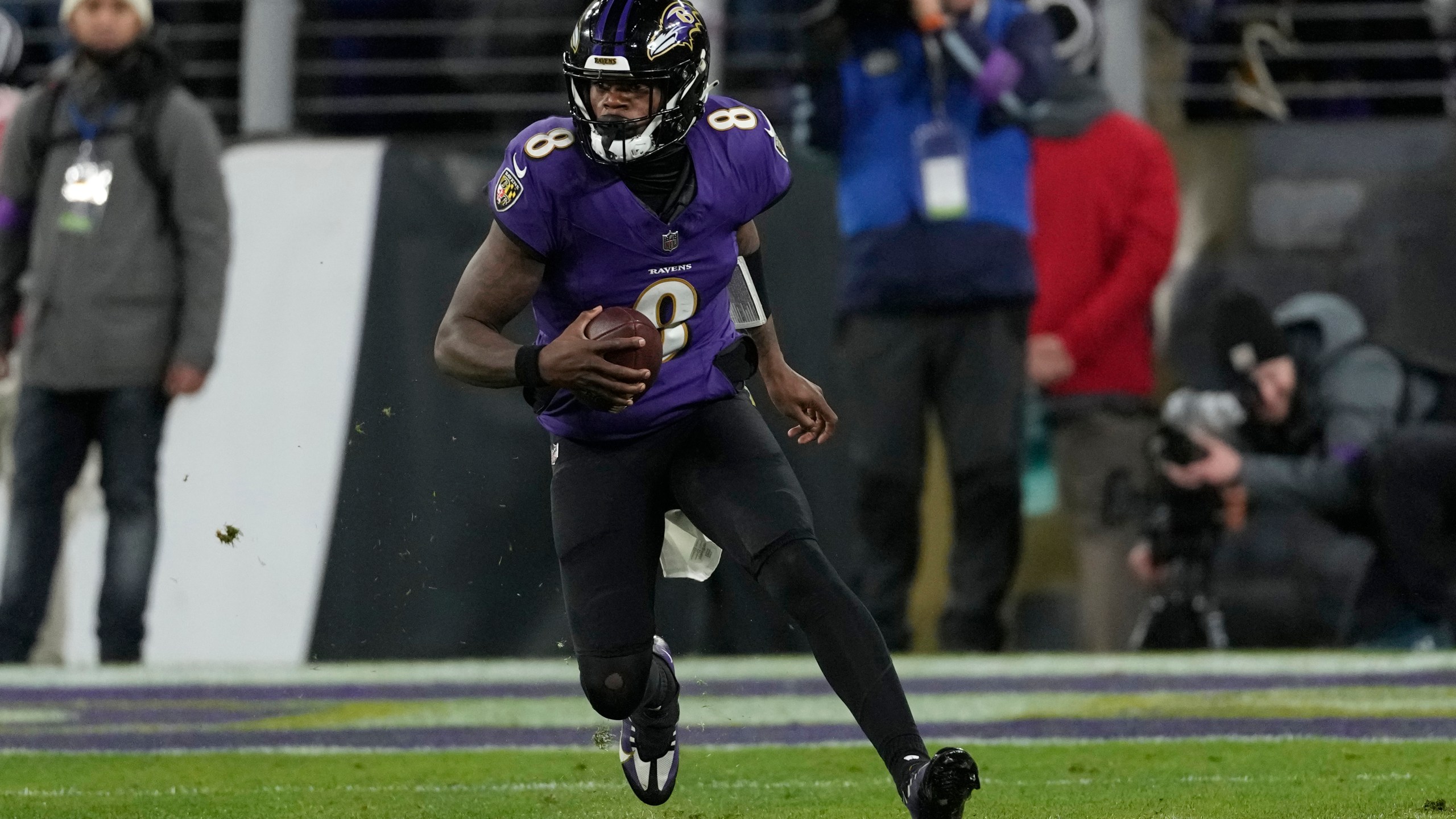 FILE - Baltimore Ravens quarterback Lamar Jackson (8) plays during the second half of the AFC Championship NFL football game against the Kansas City Chiefs, Sunday, Jan. 28, 2024, in Baltimore. The NFL announced Monday, May 13, that the Super Bowl champion Kansas City Chiefs will open the season at home against the Baltimore Ravens on Thursday, Sept. 5. The game is a rematch of the AFC championship game in January, which the Chiefs won 17-10 in Baltimore.(AP Photo/Nick Wass, File)