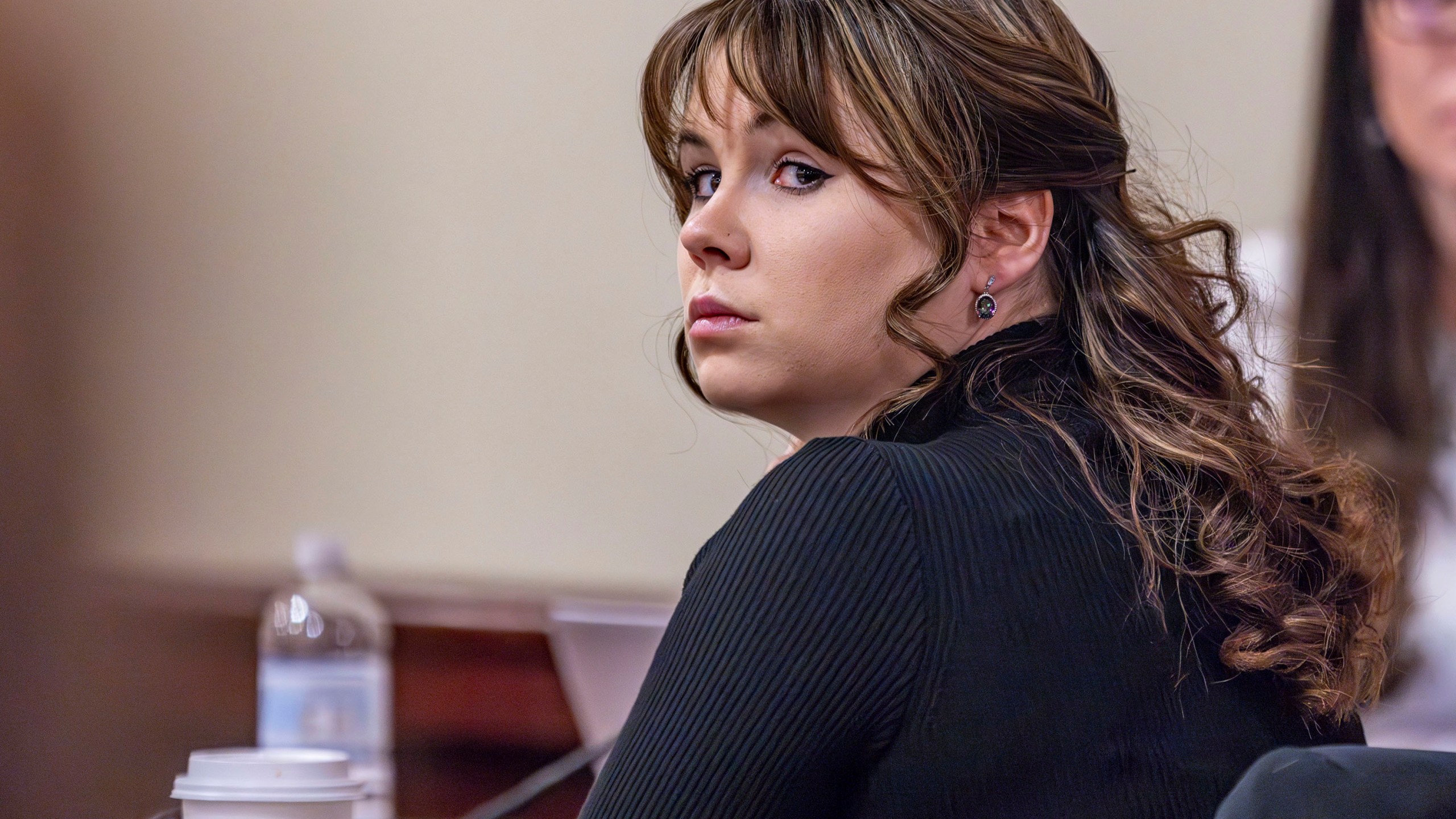 FILE - Hannah Gutierrez-Reed, the former armorer at the movie "Rust," listens to closing arguments in her trial at district court, Wednesday, March 6, 2024, in Santa Fe, N.M. The movie weapons armorer is appealing her conviction for involuntary manslaughter in the fatal shooting of a cinematographer by Alec Baldwin on the set of the Western film “Rust.” In court documents released Tuesday, May 14, 2024 a defense attorney for Gutierrez-Reed filed a notice of appeal of the March conviction by a jury. (Luis Sánchez Saturno/Santa Fe New Mexican via AP, Pool, File)