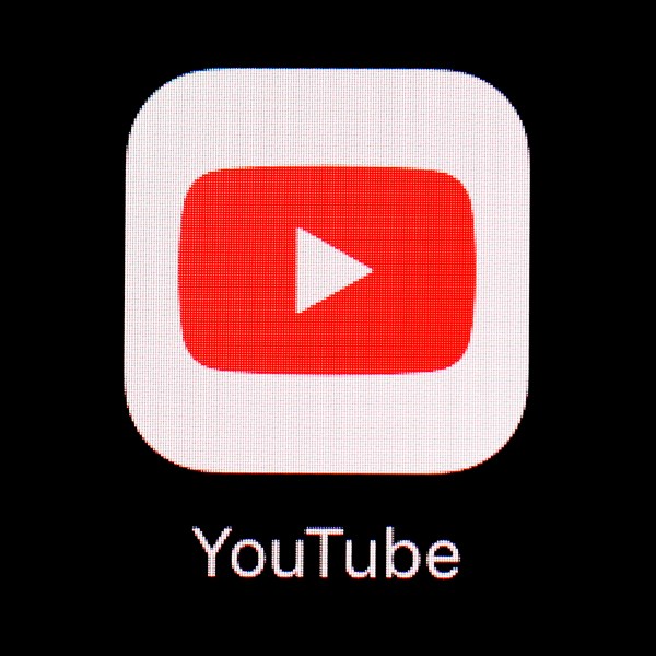 FILE - The YouTube app is displayed on an iPad in Baltimore. YouTube has blocked access to videos of a protest song in Hong Kong, days after court approved an injunction banning the song in the city. (AP Photo/Patrick Semansky, File)