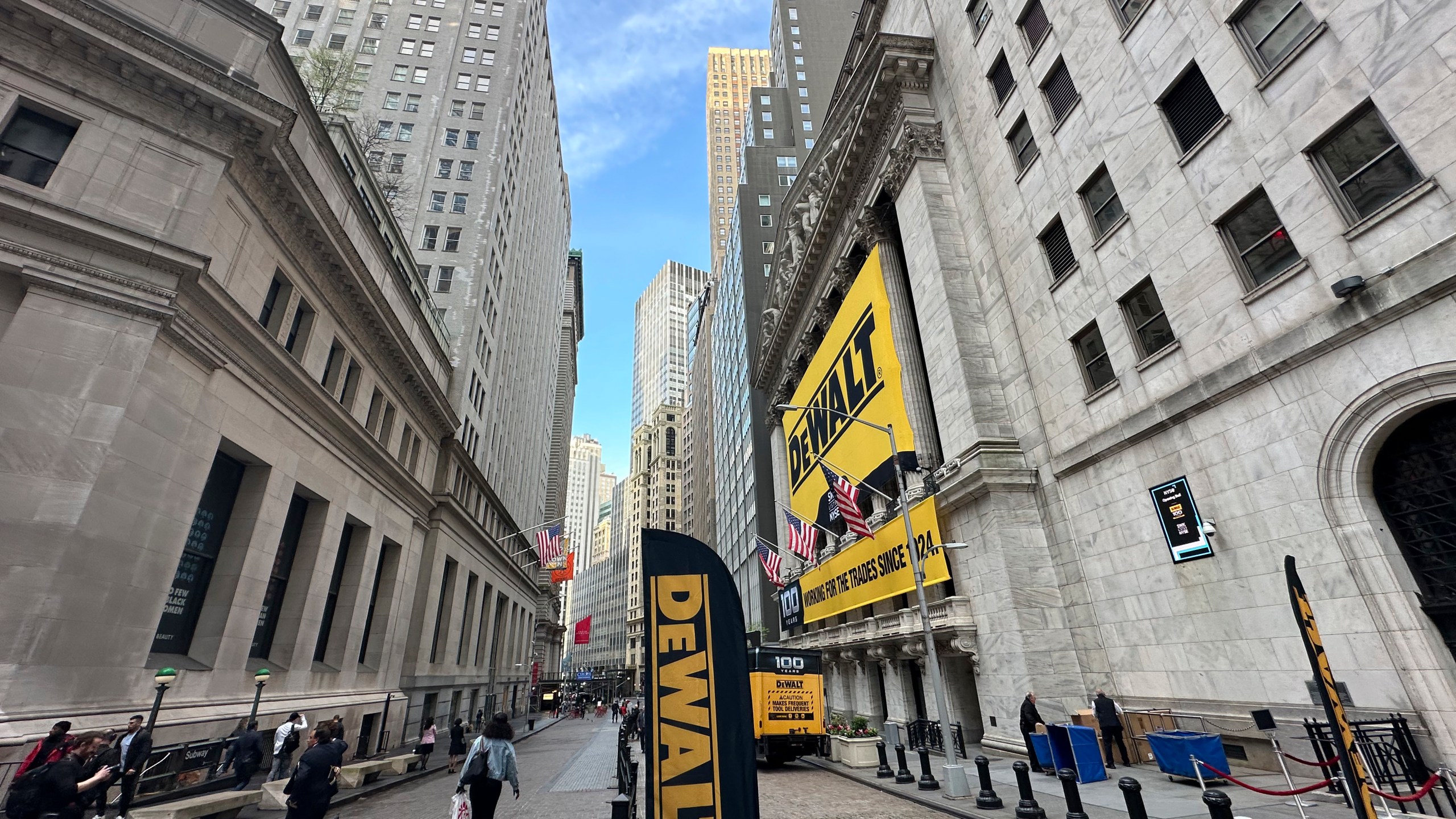 The front of the New York Stock Exchange is adorned with signs for the tool maker DeWalt in honor of the 100th year anniversary of the company on Tuesday, May 14, 2024. Markets on Wall Street inched slightly higher ahead of the release of more inflation data from the U.S. government. (AP Photo/Peter Morgan)