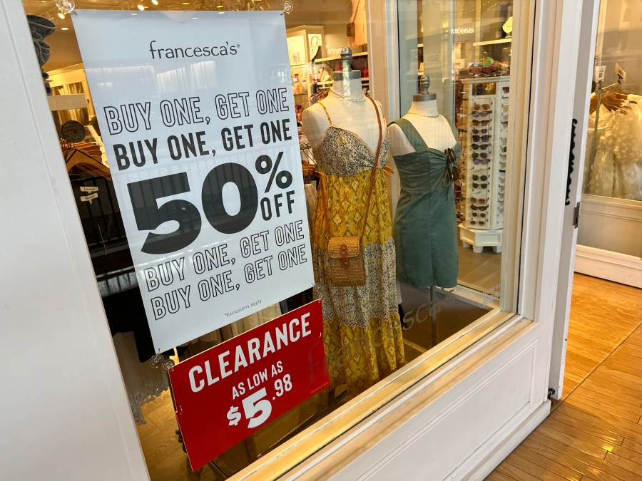 A sign trumpets discounts available in a clothing store in a mall Monday, April 29, 2024, in Lone Tree, Colo. On Wednesday, May 15, 2024, the Labor Department issues its report on inflation at the consumer level in April. (AP Photo/David Zalubowski)