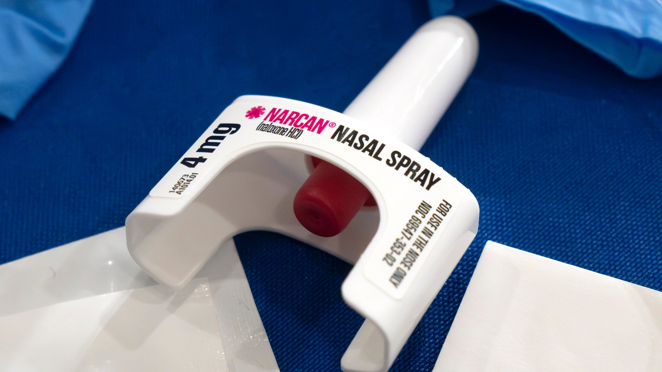 FILE - A container of Narcan, a brand name version of the opioid overdose-reversal drug naloxone, sits on a table following a demonstration at the Health and Human Services Humphrey Building on Friday, Sept. 8, 2023, in Washington. The number of U.S. fatal overdoses fell in 2023 — for only the second time since the current national epidemic of drug deaths began more than three decades ago. The Centers for Disease Control and Prevention posted the numbers on Wednesday, May 15, 2024. (AP Photo/Mark Schiefelbein, File)