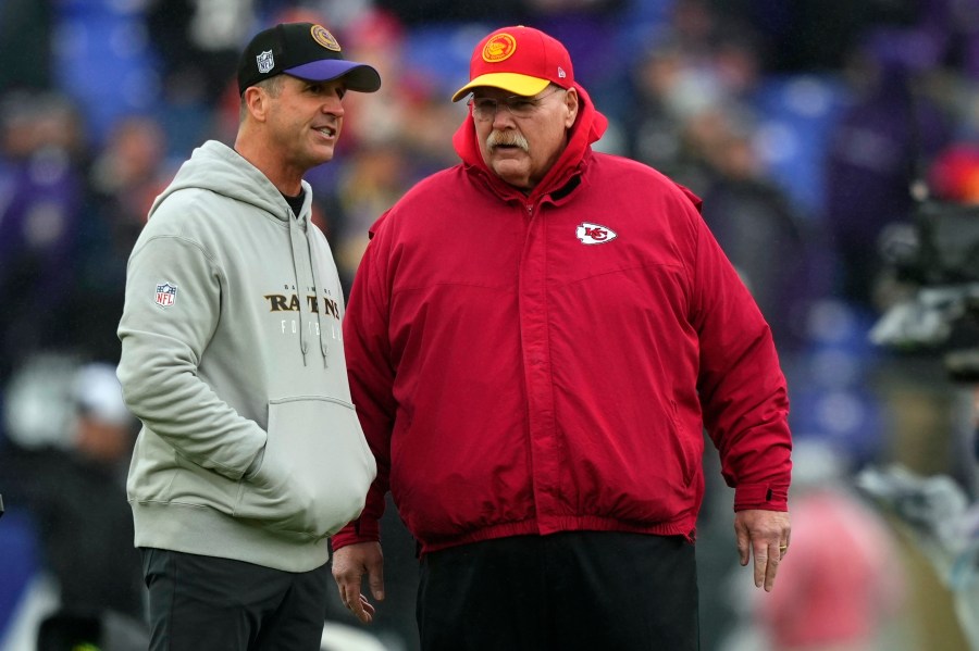 FILE - Kansas City Chiefs head coach Andy Reid and Baltimore Ravens head coach John Harbaugh talk before the AFC Championship NFL football game, Sunday, Jan. 28, 2024, in Baltimore. The NFL announced Monday, May 13, 2024, that the Super Bowl champion Kansas City Chiefs will open the season at home against the Baltimore Ravens on Thursday, Sept. 5. The game is a rematch of the AFC championship game in January, which the Chiefs won 17-10 in Baltimore.(AP Photo/Matt Slocum, File)