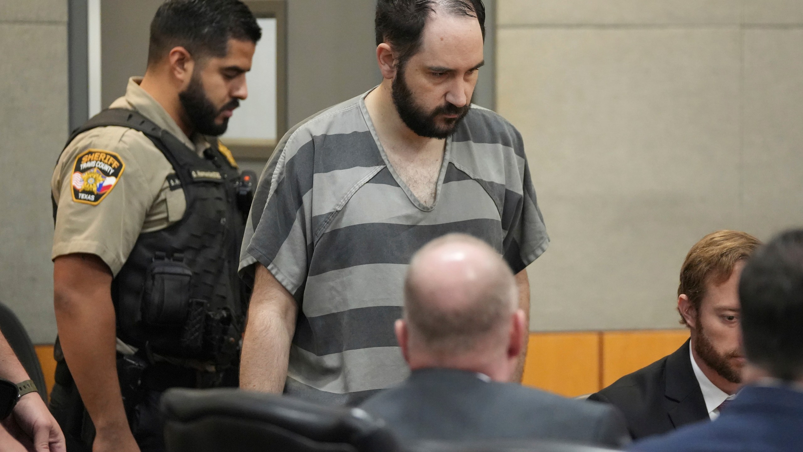 FILE - Daniel Perry enters the courtroom at the Blackwell-Thurman Criminal Justice Center, May 10, 2023, in Austin, Texas. The Texas Board of Pardons and Paroles on Thursday, May 16, 2024, recommended a full pardon for Perry, a former U.S. Army sergeant convicted of murder for fatally shooting an armed demonstrator in 2020 during nationwide protests against police violence and racial injustice. (Jay Janner/Austin American-Statesman via AP, Pool, File)