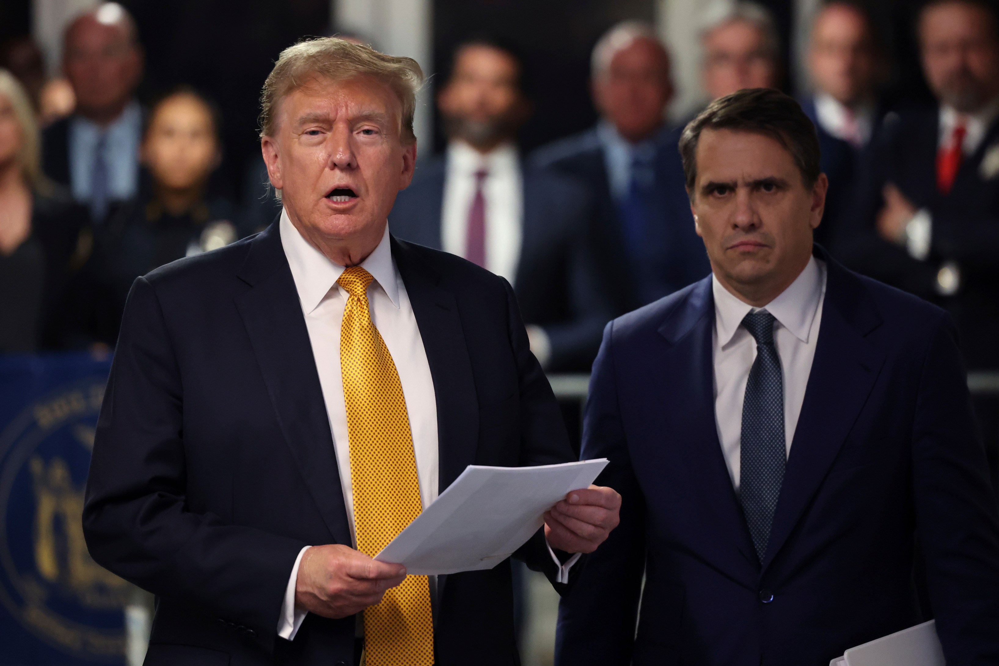 Former President Donald Trump speaks alongside his attorney Todd Blanche following the day's proceedings in his trial Tuesday, May 21, 2024, in Manhattan Criminal Court in New York. (Michael M. Santiago/Pool Photo via AP)