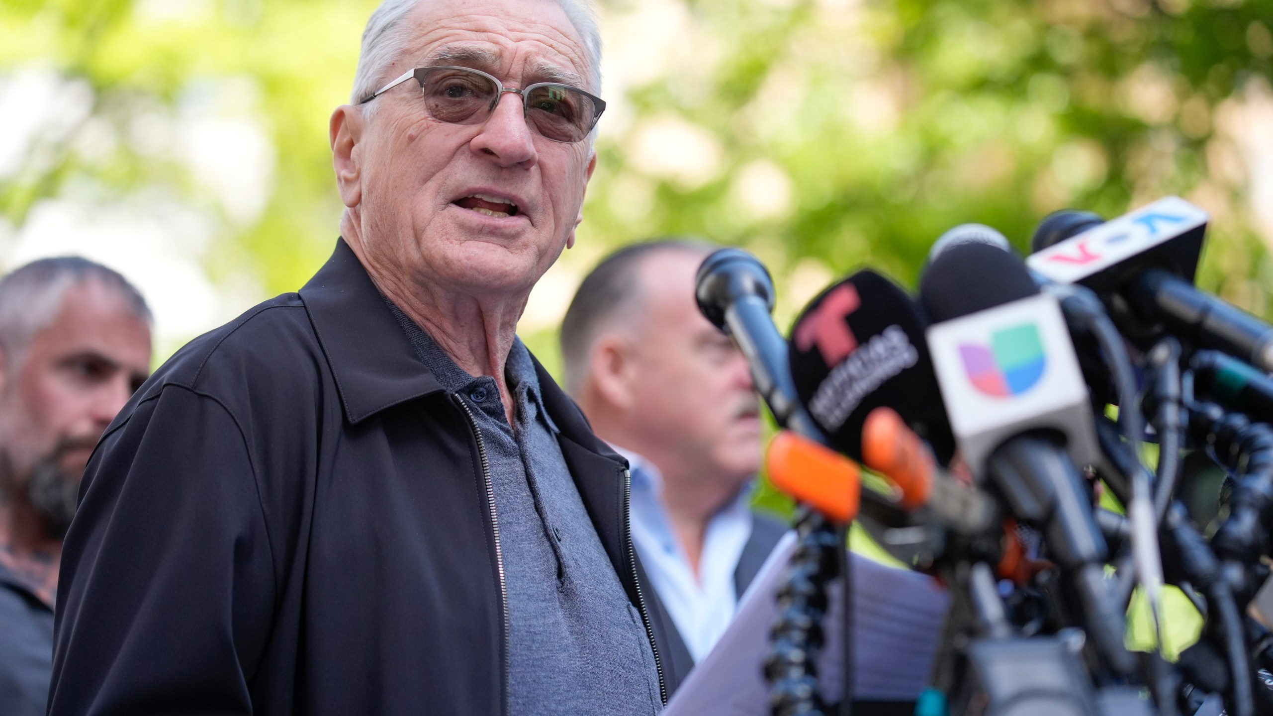 Robert De Niro speaks to reporters in support of President Joe Biden across the street from former President Donald Trump's criminal trial in New York, Tuesday, May 28, 2024. (AP Photo/Seth Wenig)