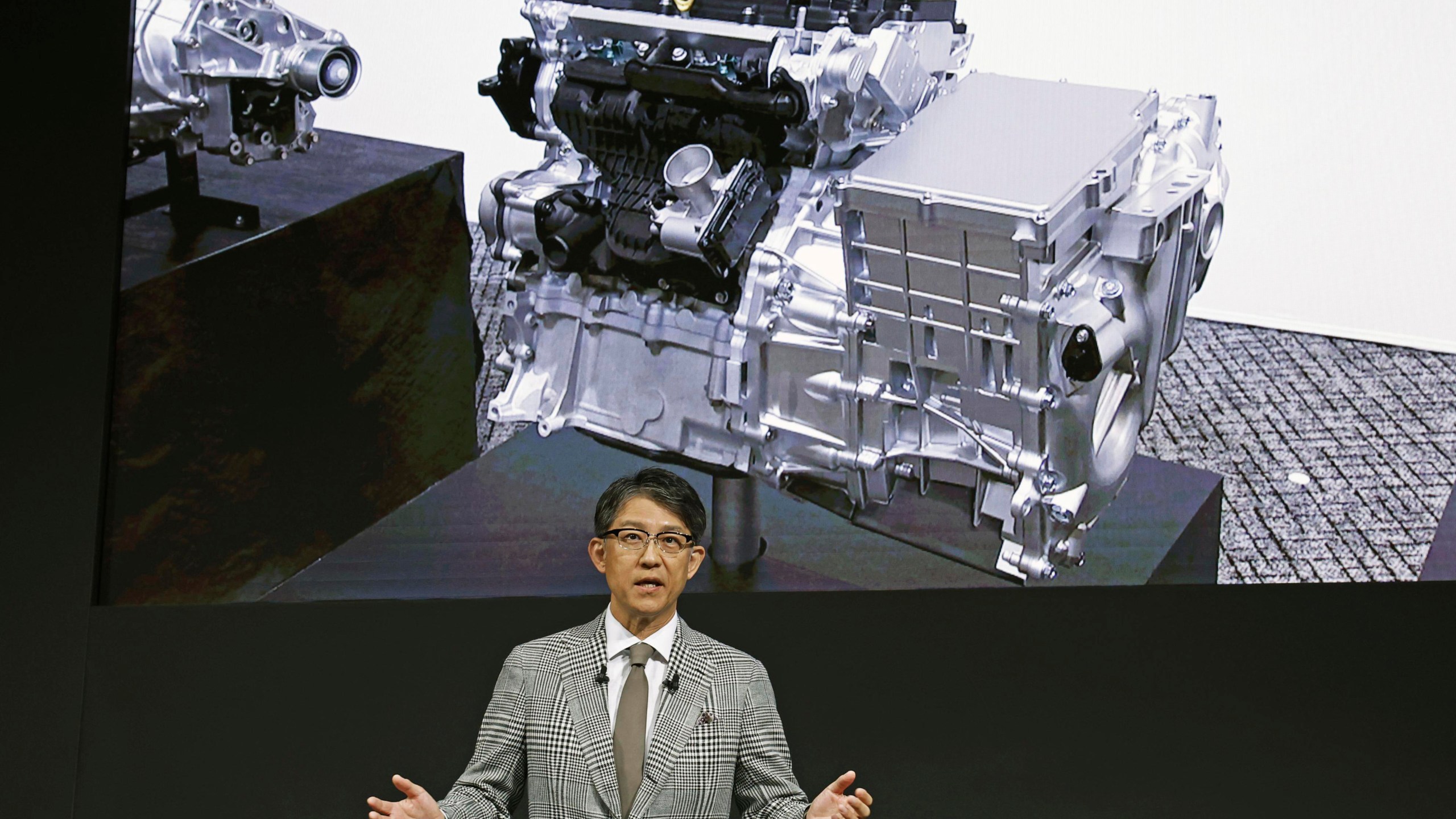 Koji Sato, chief executive of Toyota Motor Corp., speaks during a news conference in Tokyo, Tuesday, May 28, 2024. “An engine reborn.” That's how Japanese automaker Toyota introduced plans for a new lean compact motor that will cast a futuristic spin on the traditional internal combustion engine. (Kyodo News via AP)