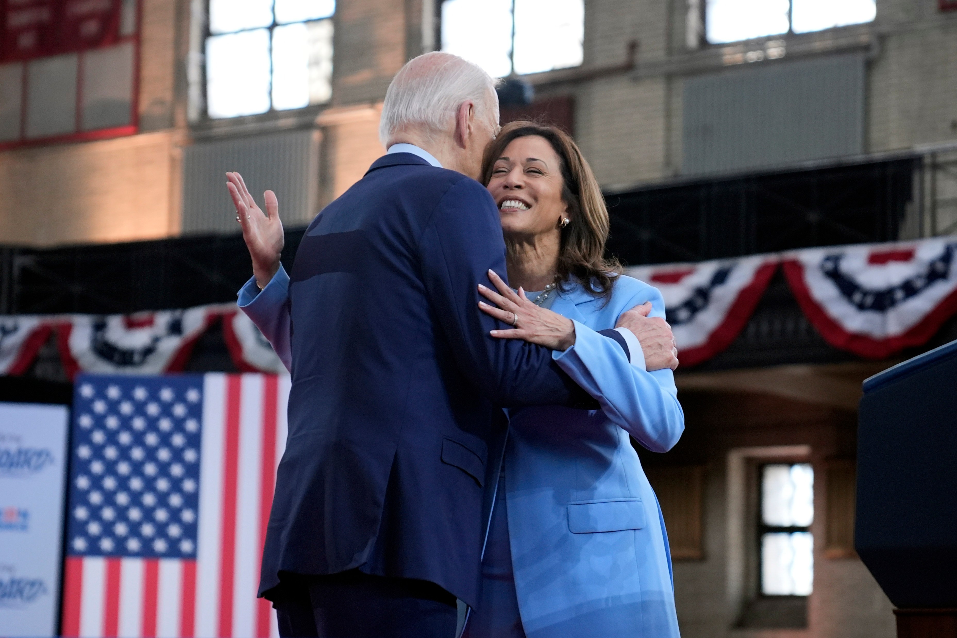 President Joe Biden hugs Vice President Kamala Harris during a campaign event at Girard College, Wednesday, May 29, 2024, in Philadelphia. (AP Photo/Evan Vucci)