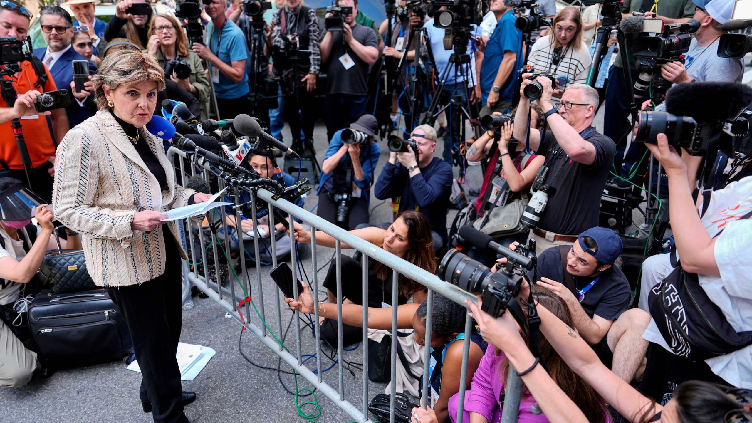 Attorney Gloria Allred speaks during a press conference outside Manhattan Criminal Court, Wednesday, May 29, 2024, in New York. Allred represents Miriam Haley, a former TV and film production assistant who Harvey Weinstein was convicted of sexually assaulting. Manhattan prosecutors told a judge Wednesday they are evaluating more claims of sexual misconduct made against Weinstein and could potentially seek a new indictment against him before his scheduled retrial on rape and sexual assault charges. (AP Photo/Julia Nikhinson)