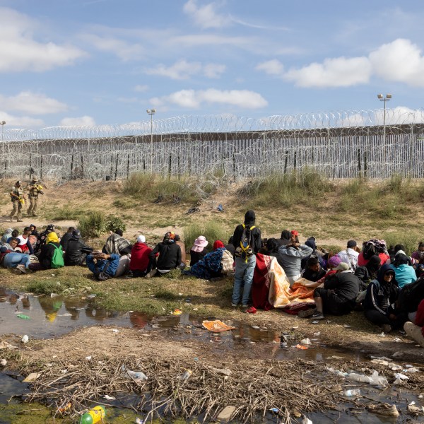 Texas National Guard members deploy pepper spray on migrants at camp in Rio Grande on April 20, 2024.