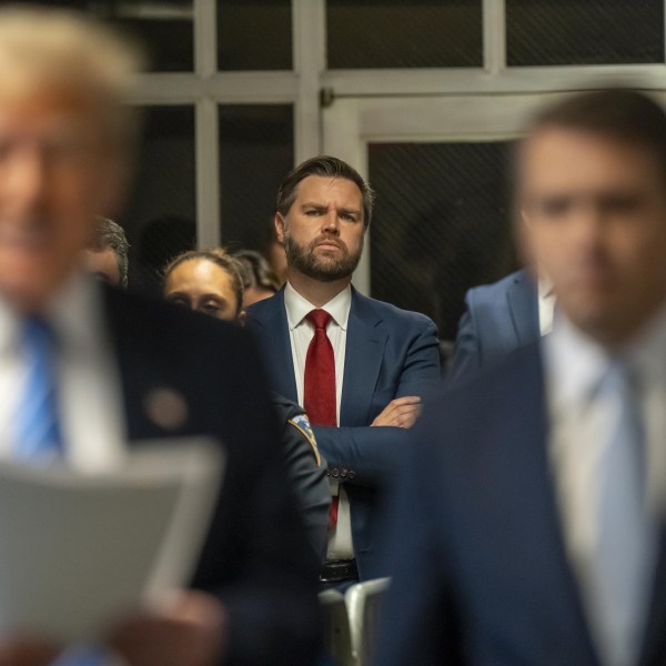 Senator JD Vance, a Republican from Ohio watches as Donald Trump speaks to the media at Manhattan criminal court May 13, 2024.