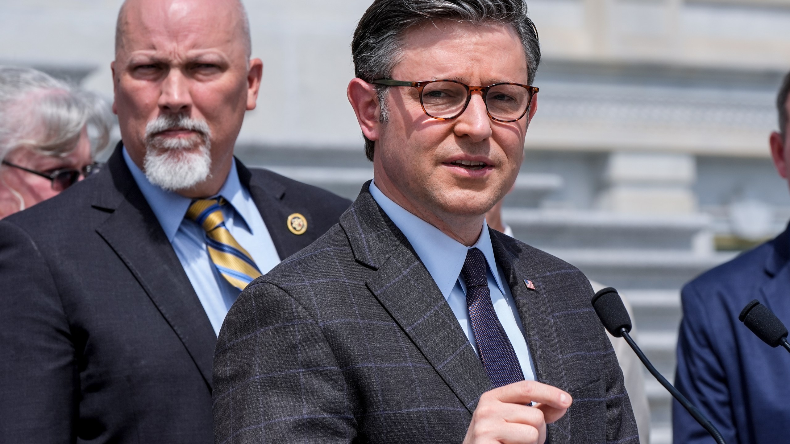 Speaker of the House Mike Johnson, R-La., joined at left by Rep. Chip Roy, R-Texas, talk to reporters about their intention to require American citizenship to vote in national elections, as they introduce the Safeguard American Voter Eligibility Act, at the Capitol in Washington, Wednesday, May 8, 2024. (AP Photo/J. Scott Applewhite)