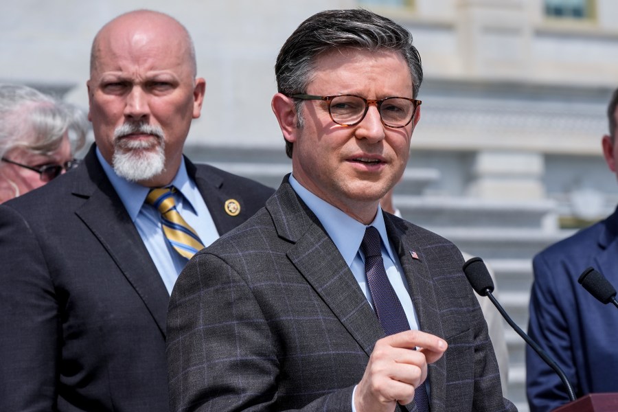 Speaker of the House Mike Johnson, R-La., joined at left by Rep. Chip Roy, R-Texas, talk to reporters about their intention to require American citizenship to vote in national elections, as they introduce the Safeguard American Voter Eligibility Act, at the Capitol in Washington, Wednesday, May 8, 2024. (AP Photo/J. Scott Applewhite)