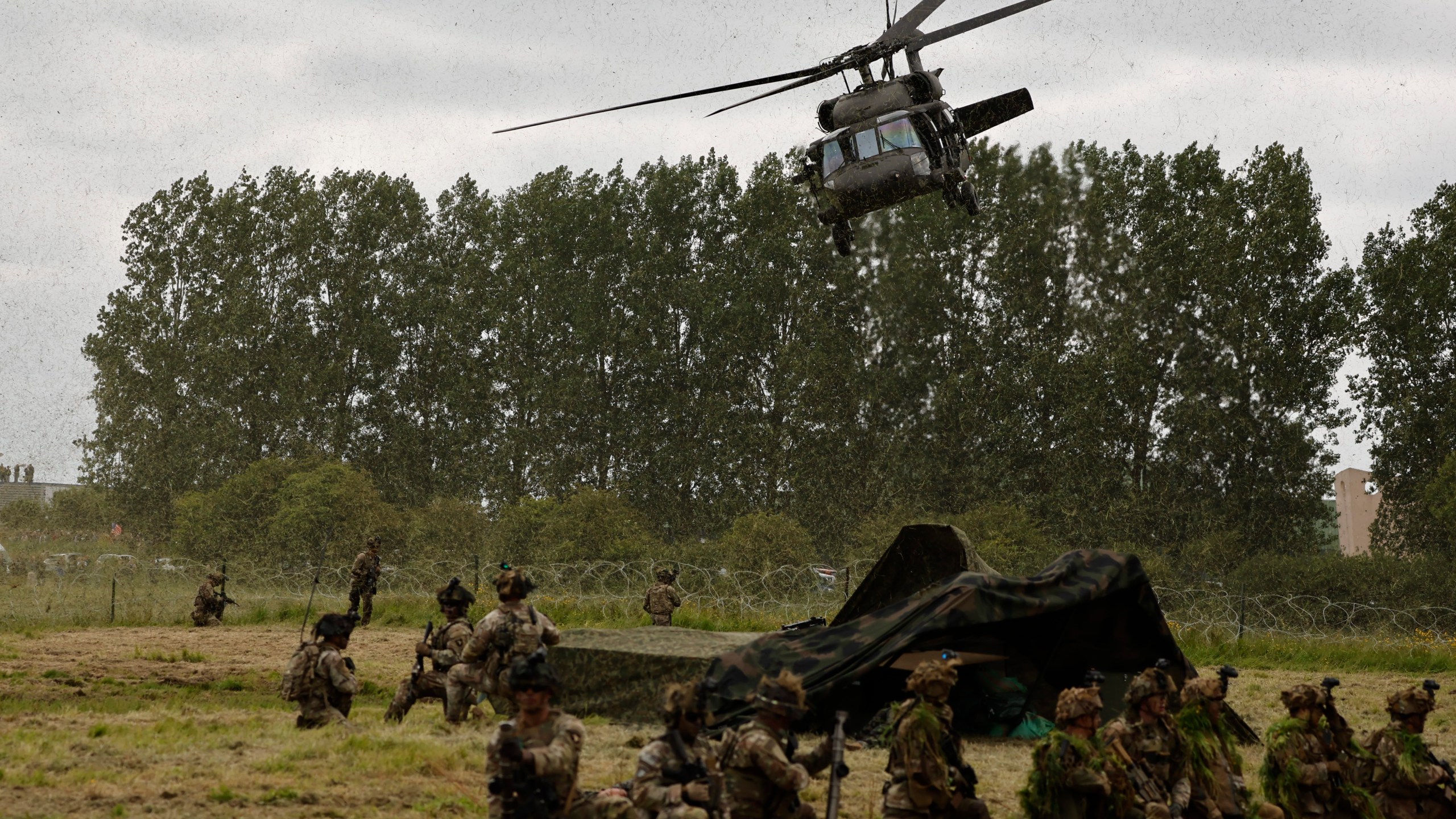 The US Army conducts an air assault demonstration in Carentan-Les-Marais in Normandy, France on Sunday, June 02, 2024, ahead of D-Day 80th anniversary commemorations. (AP Photo/Jeremias Gonzalez)