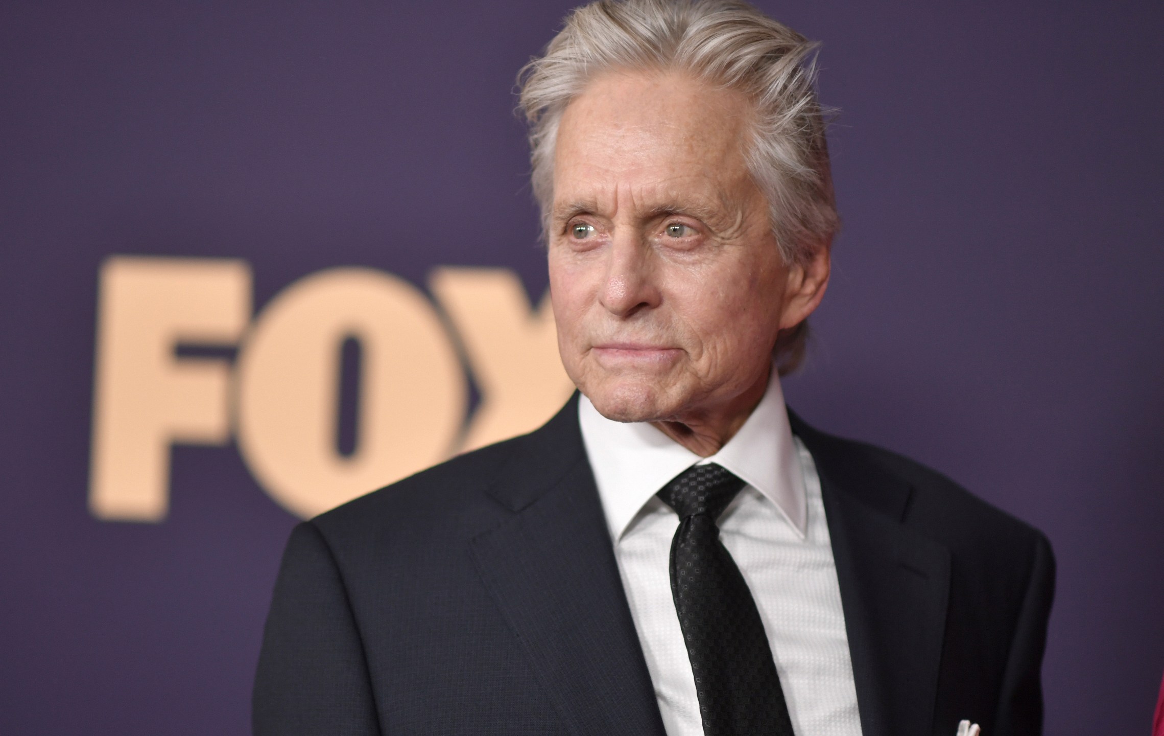 FILE - Michael Douglas arrives at the 71st Primetime Emmy Awards on Sunday, Sept. 22, 2019, at the Microsoft Theater in Los Angeles. Douglas on Sunday, June 2, 2024, paid a solidarity visit to an Israeli kibbutz that was hit hard in the Oct. 7, 2023, Hamas attack that sparked Israel’s war against the Islamic militant group. Douglas met with members of Kibbutz Be’eri and visited burnt-out homes destroyed in the attack. (Photo by Richard Shotwell/Invision/AP, File)