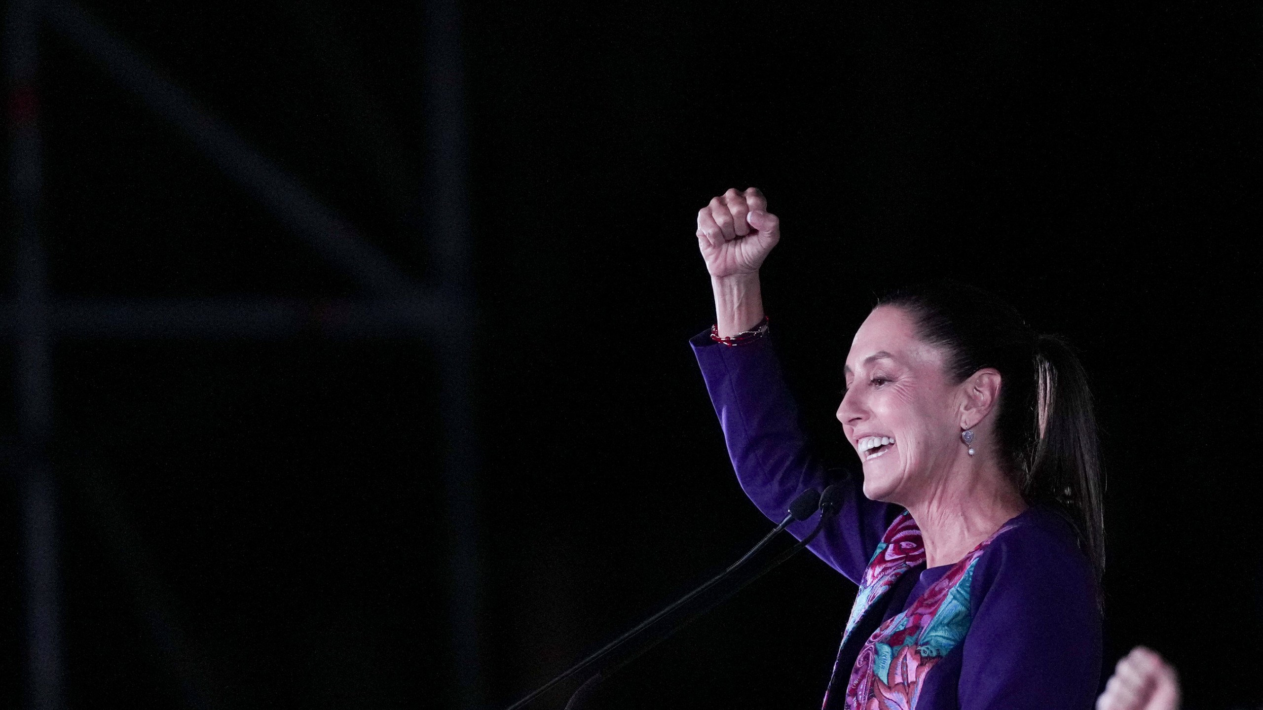 President-elect Claudia Sheinbaum addresses supporters at the Zocalo, Mexico City's main square, after the National Electoral Institute announced she held an irreversible lead in the election, early Monday, June 3, 2024. (AP Photo/Marco Ugarte)