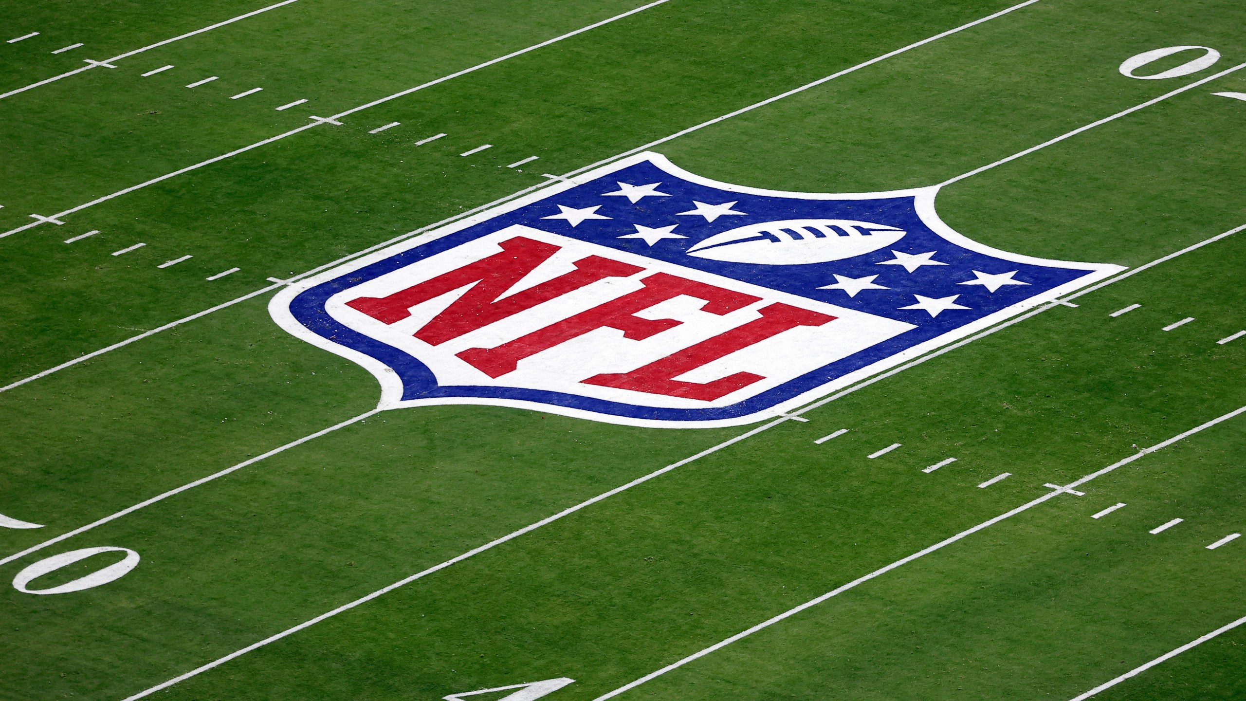 FILE - The NFL logo is seen during the NFL Super Bowl 58 football game Sunday, Feb. 11, 2024, in Las Vegas. Opening arguments are expected to begin Thursday, June 6, 2024, in federal court in a class-action lawsuit filed by “Sunday Ticket” subscribers claiming the NFL broke antitrust laws. The lawsuit was filed in 2015 and has withstood numerous challenges, including a dismissal that was overturned. (AP Photo/Adam Hunger, File)