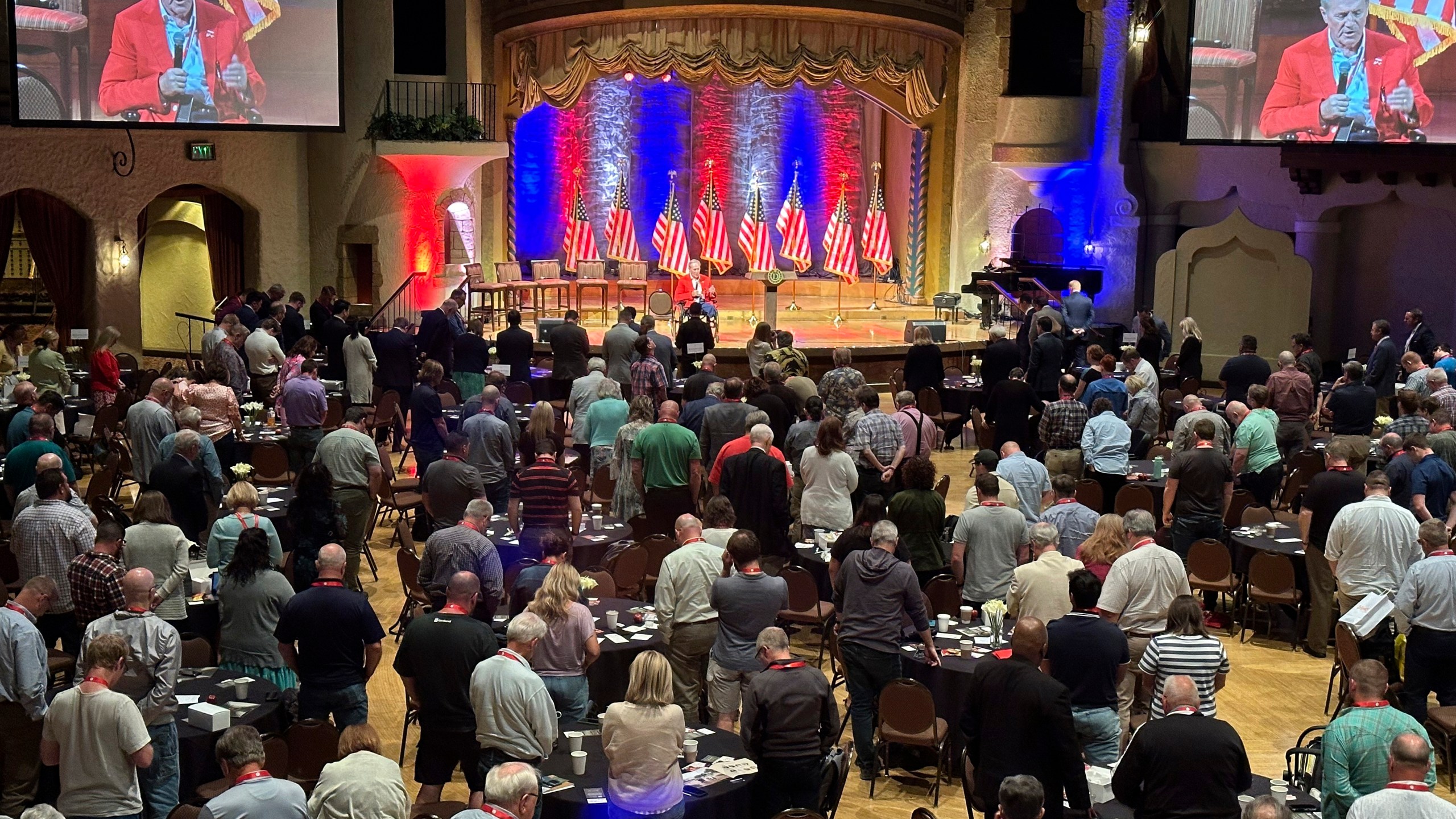 Evangelist Tim Lee leads audience members in prayer at the Life & Liberty Forum on Monday, June 10, 2024, in Indianapolis. The forum, put on by the institute, is expected to feature a taped message from former President Donald Trump, Southern Baptist leaders and others. (AP Photo/Peter Smith)